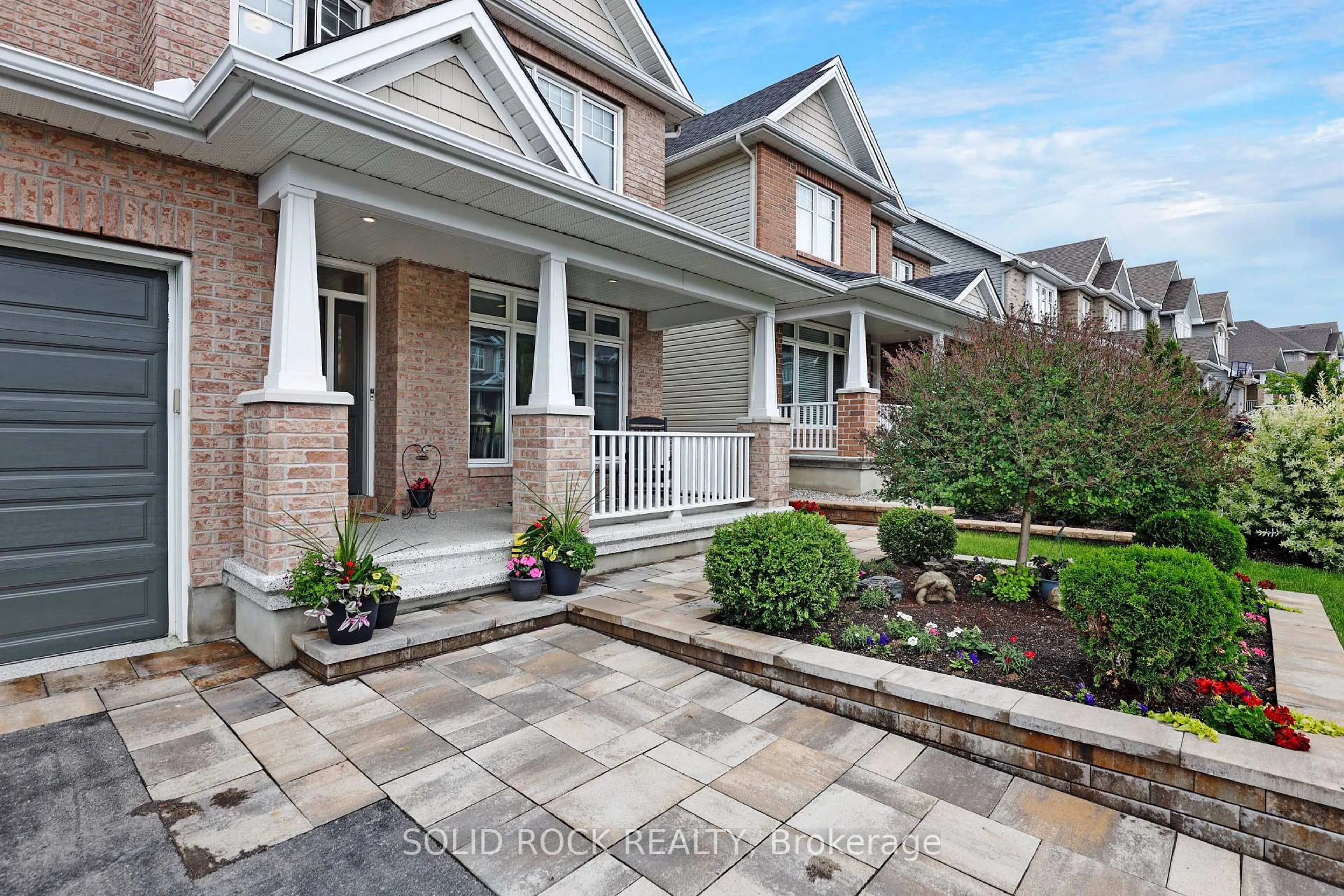 Home with brick exterior material, street for 703 Mashkig Ave, Ottawa Ontario K4A 0Y7