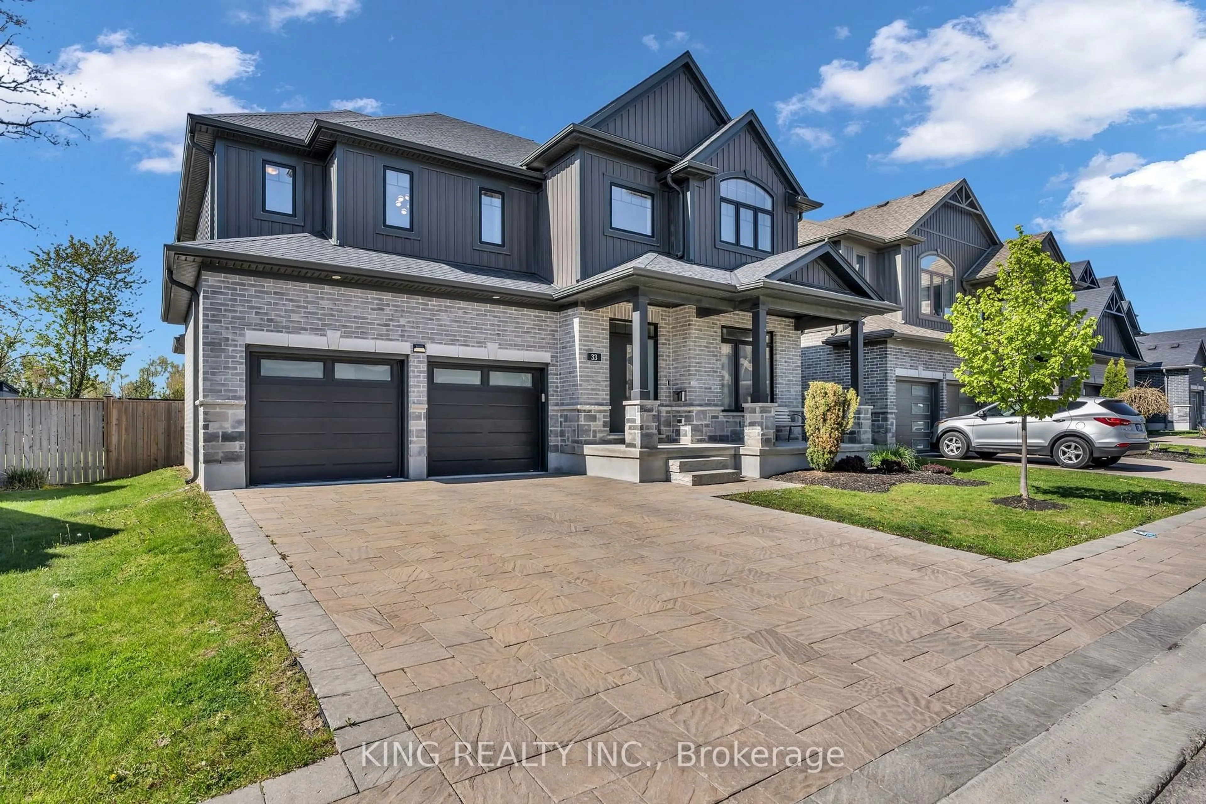 Home with brick exterior material, street for 1061 Eagletrace Dr #33, London North Ontario N6G 0T3