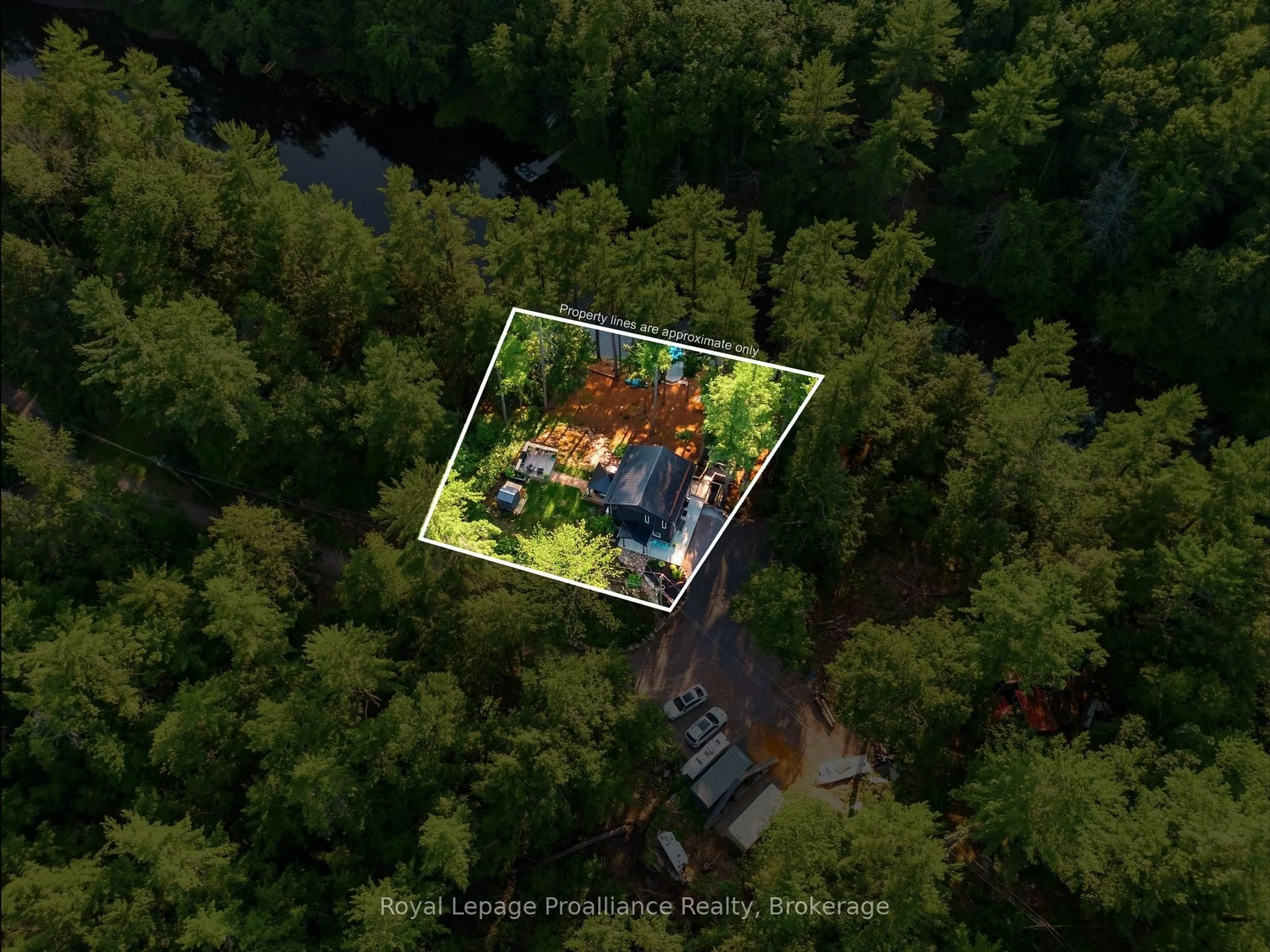 A pic from outside/outdoor area/front of a property/back of a property/a pic from drone, forest/trees view for 282-G Cottage Lane, Tweed Ontario K0K 3J0
