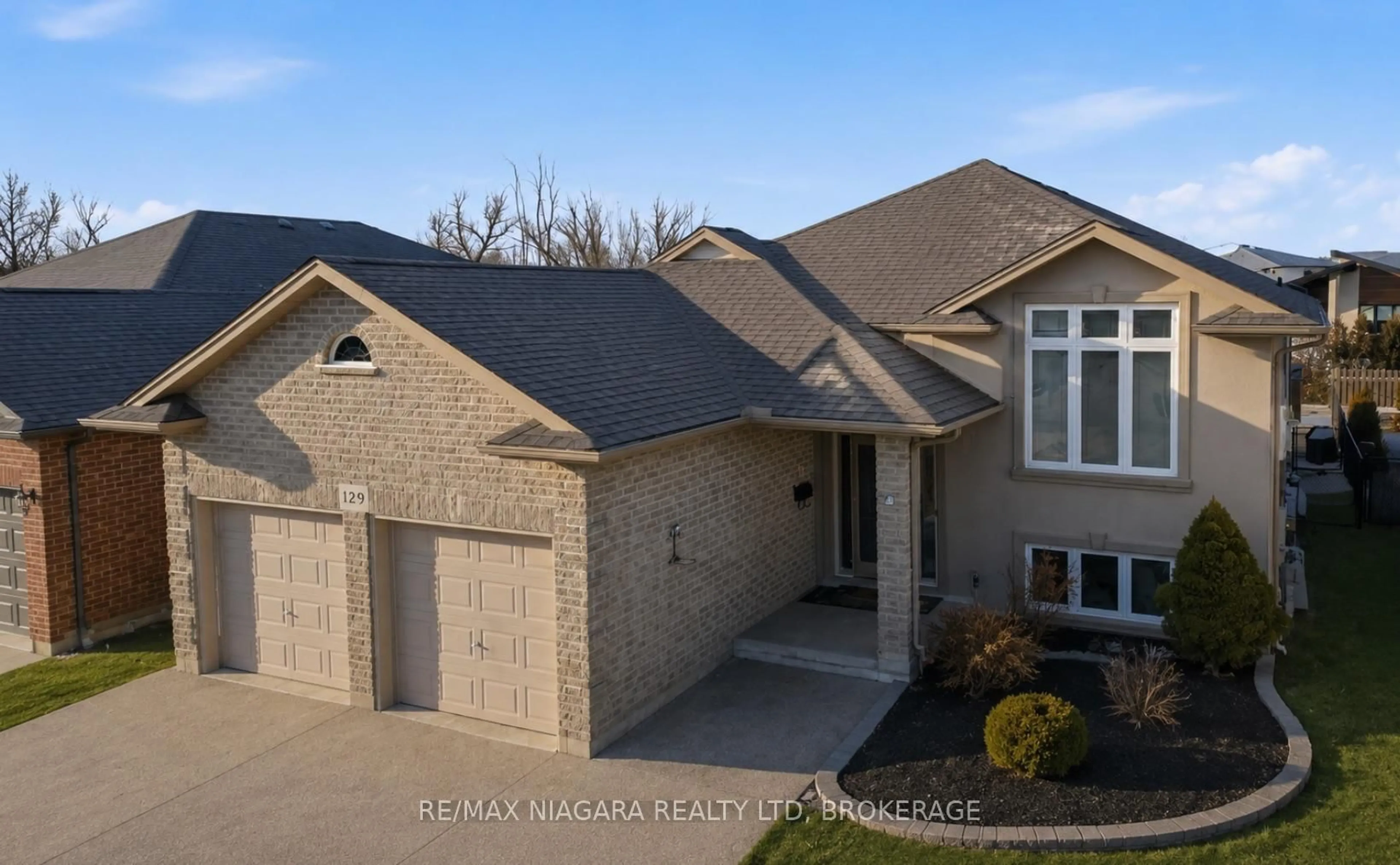 Home with brick exterior material, street for 129 Wellbrook Ave, Welland Ontario L3C 7M8