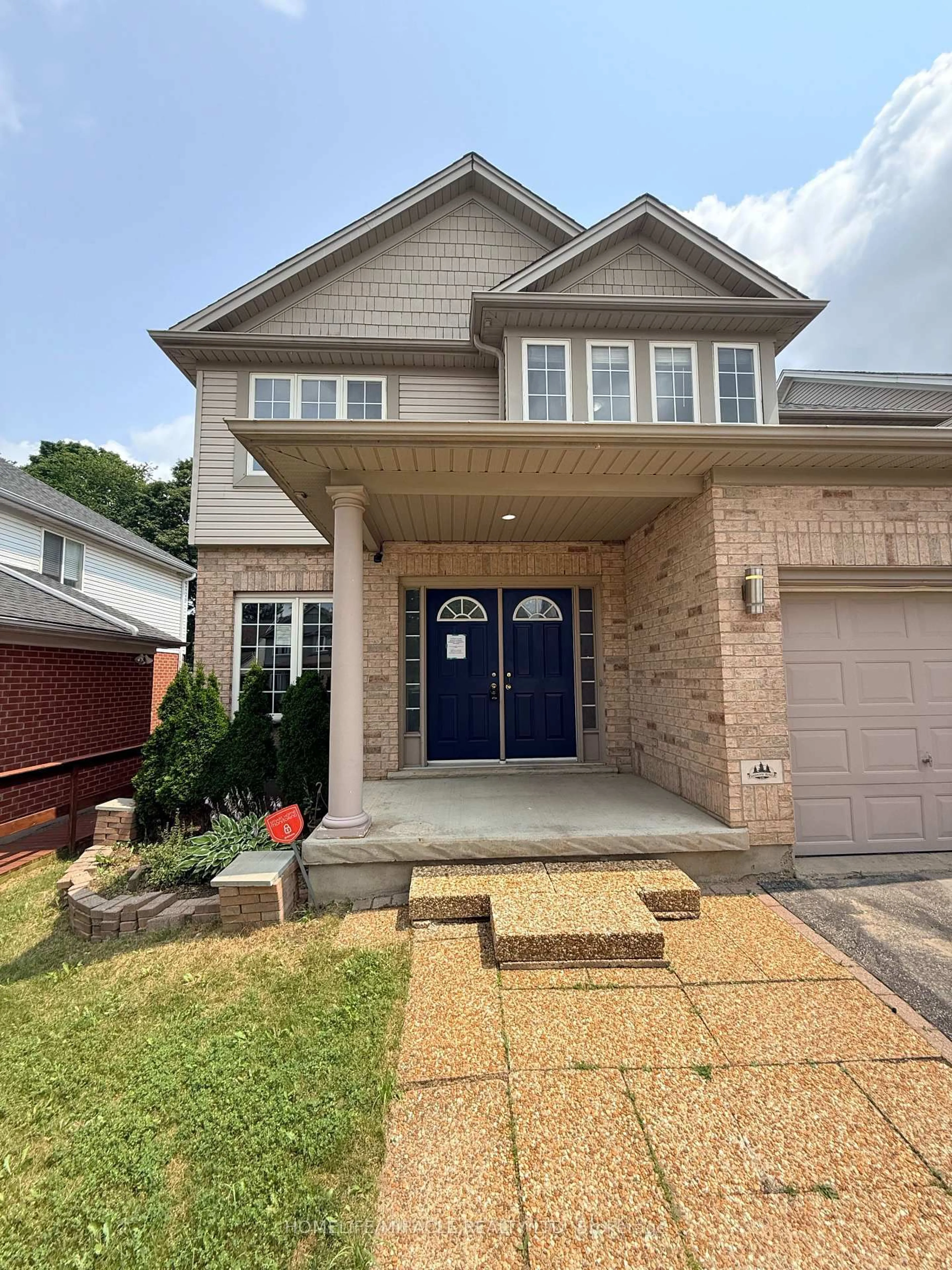 Home with brick exterior material, street for 14 Hearthbridge St, Kitchener Ontario N2R 1L5