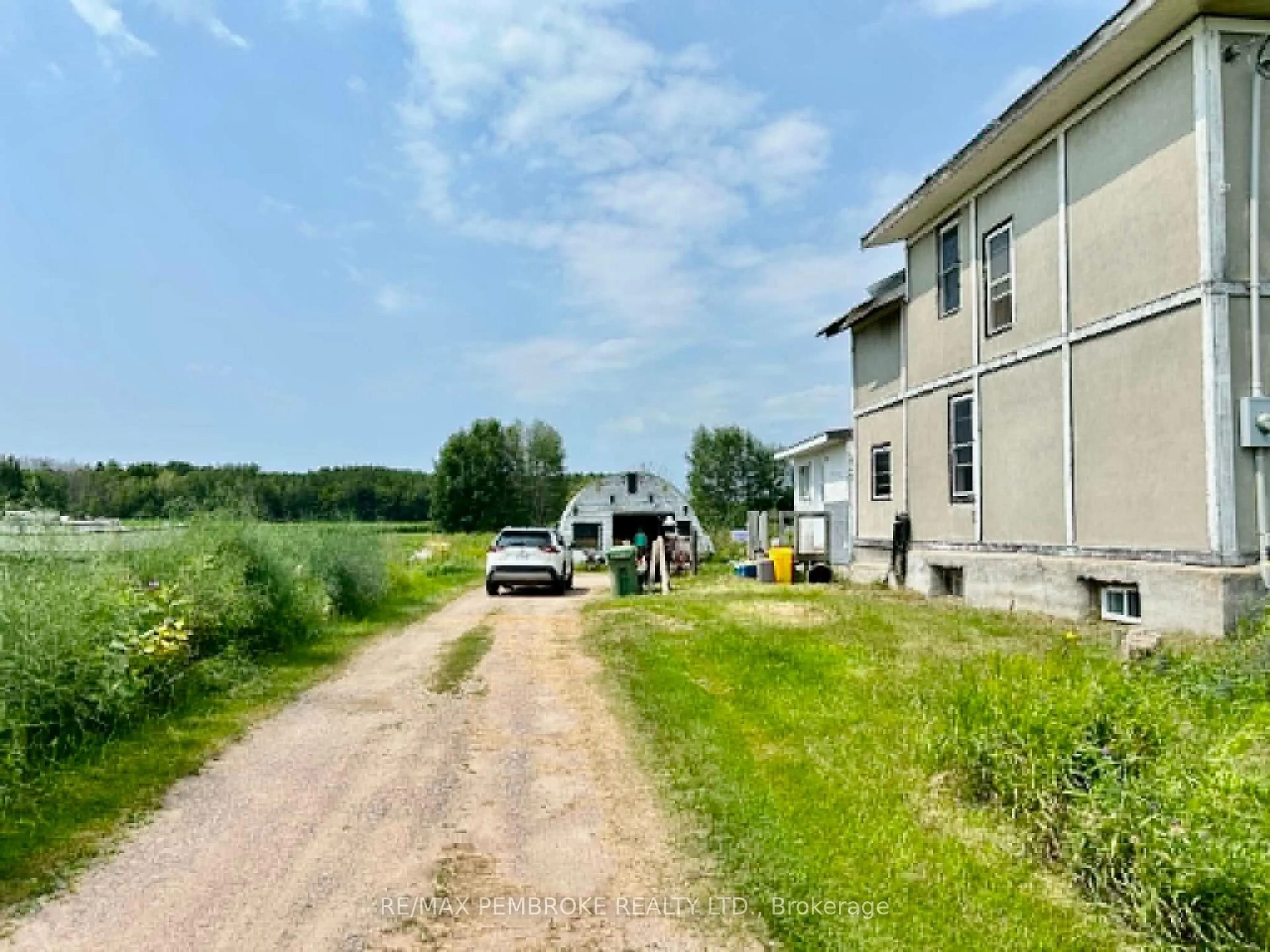A pic from outside/outdoor area/front of a property/back of a property/a pic from drone, unknown for 827 B Line Rd, Pembroke Ontario K8A 6W5