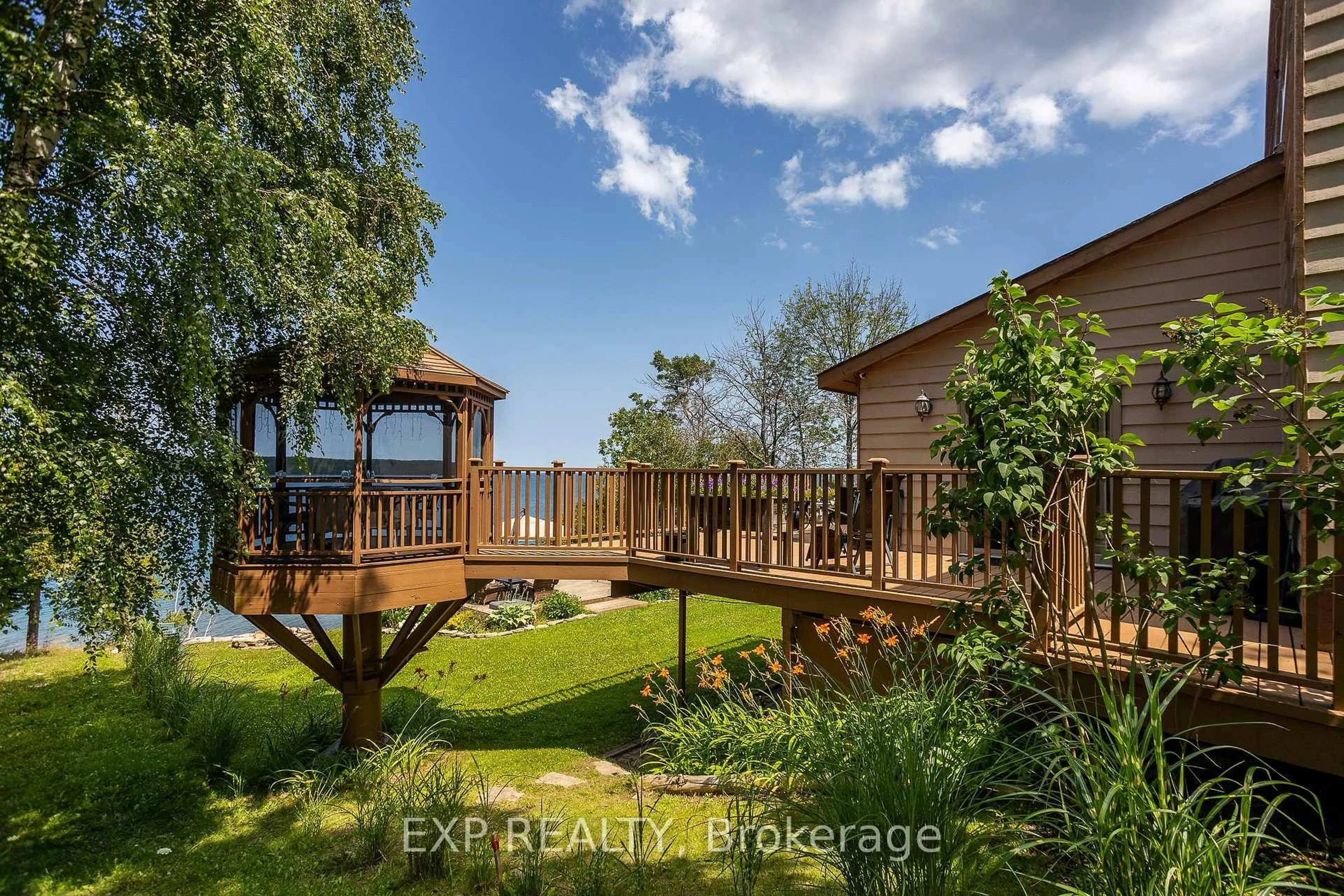 A pic from outside/outdoor area/front of a property/back of a property/a pic from drone, water/lake/river/ocean view for 121 Ivy Dr, Georgian Bluffs Ontario N0H 2T0