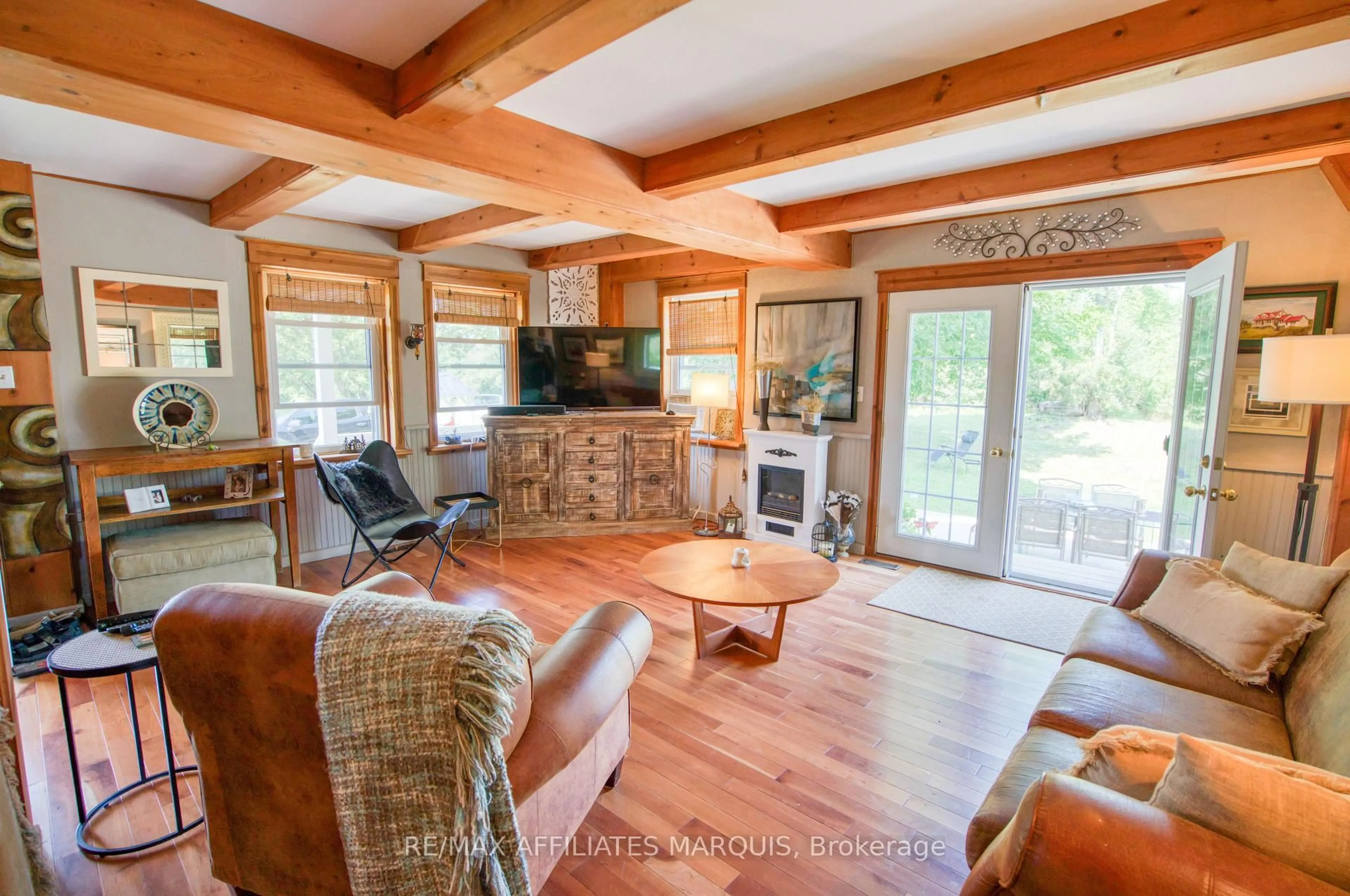 Living room with furniture, wood/laminate floor for 531 Little Crosby Lake Rd, Rideau Lakes Ontario K0G 1X0
