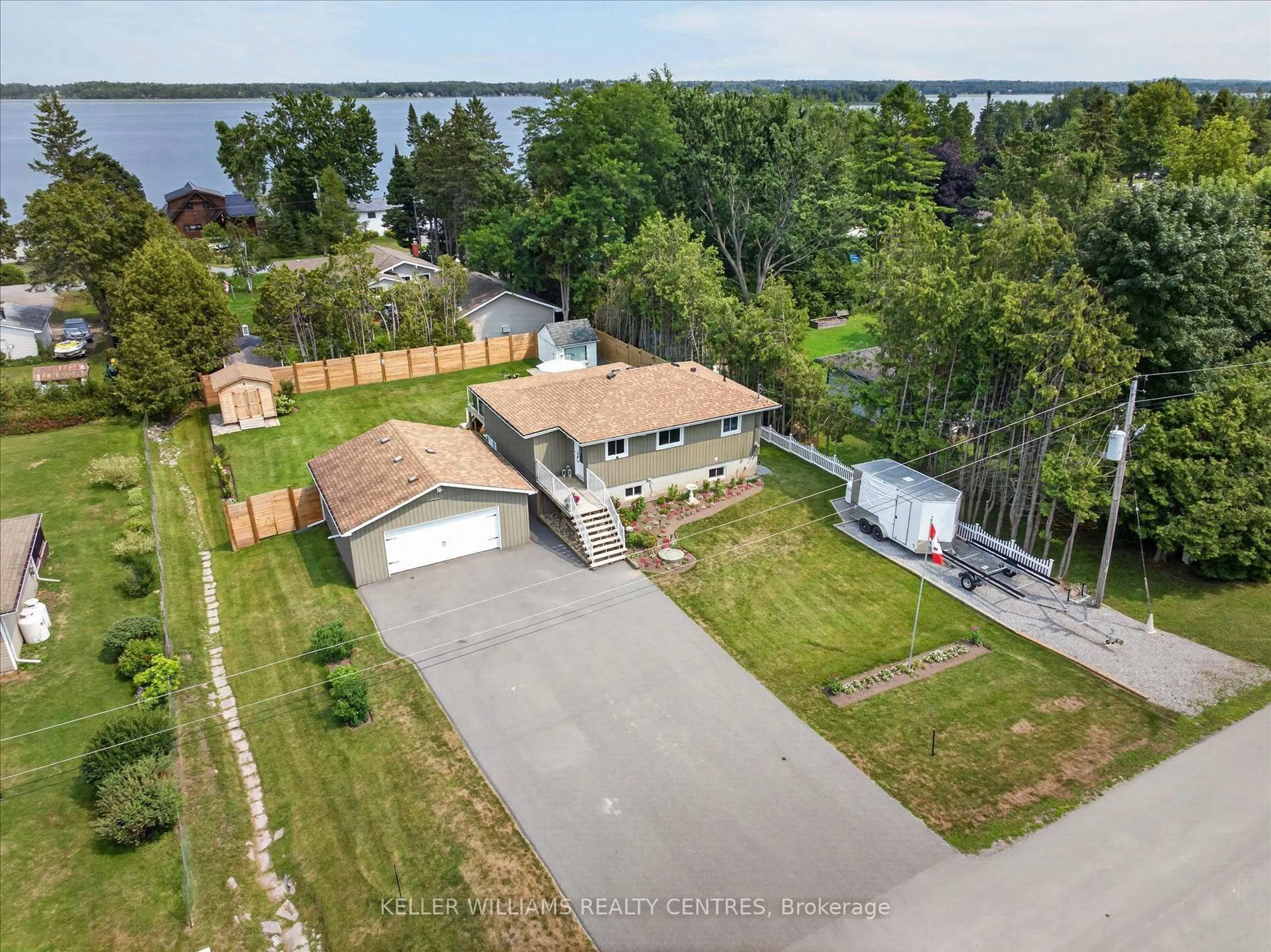 A pic from outside/outdoor area/front of a property/back of a property/a pic from drone, water/lake/river/ocean view for 268 Crosby Dr, Kawartha Lakes Ontario K0M 1A0