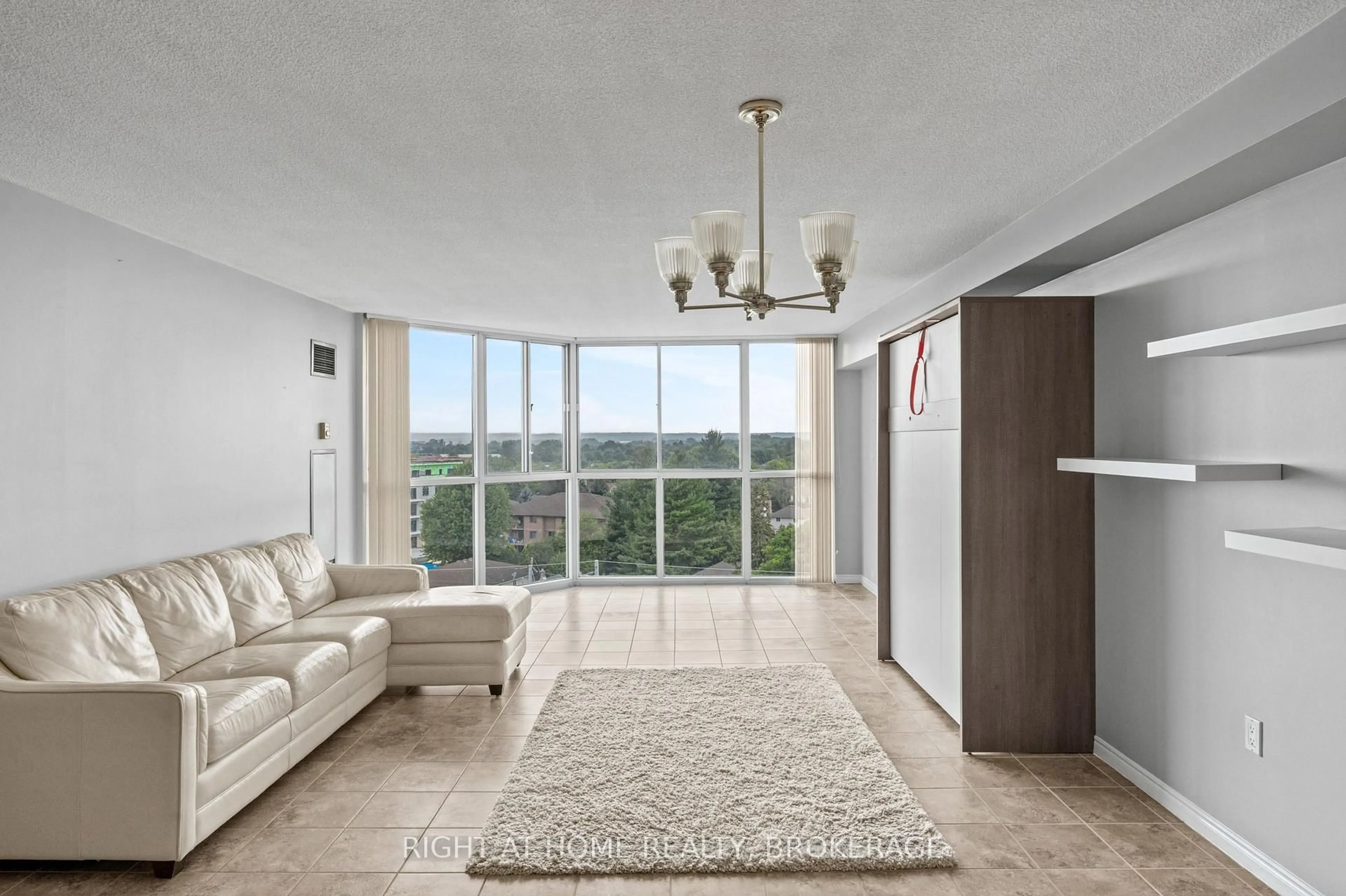 Living room with furniture, unknown for 162 Martindale Rd #801, St. Catharines Ontario L2S 3S4