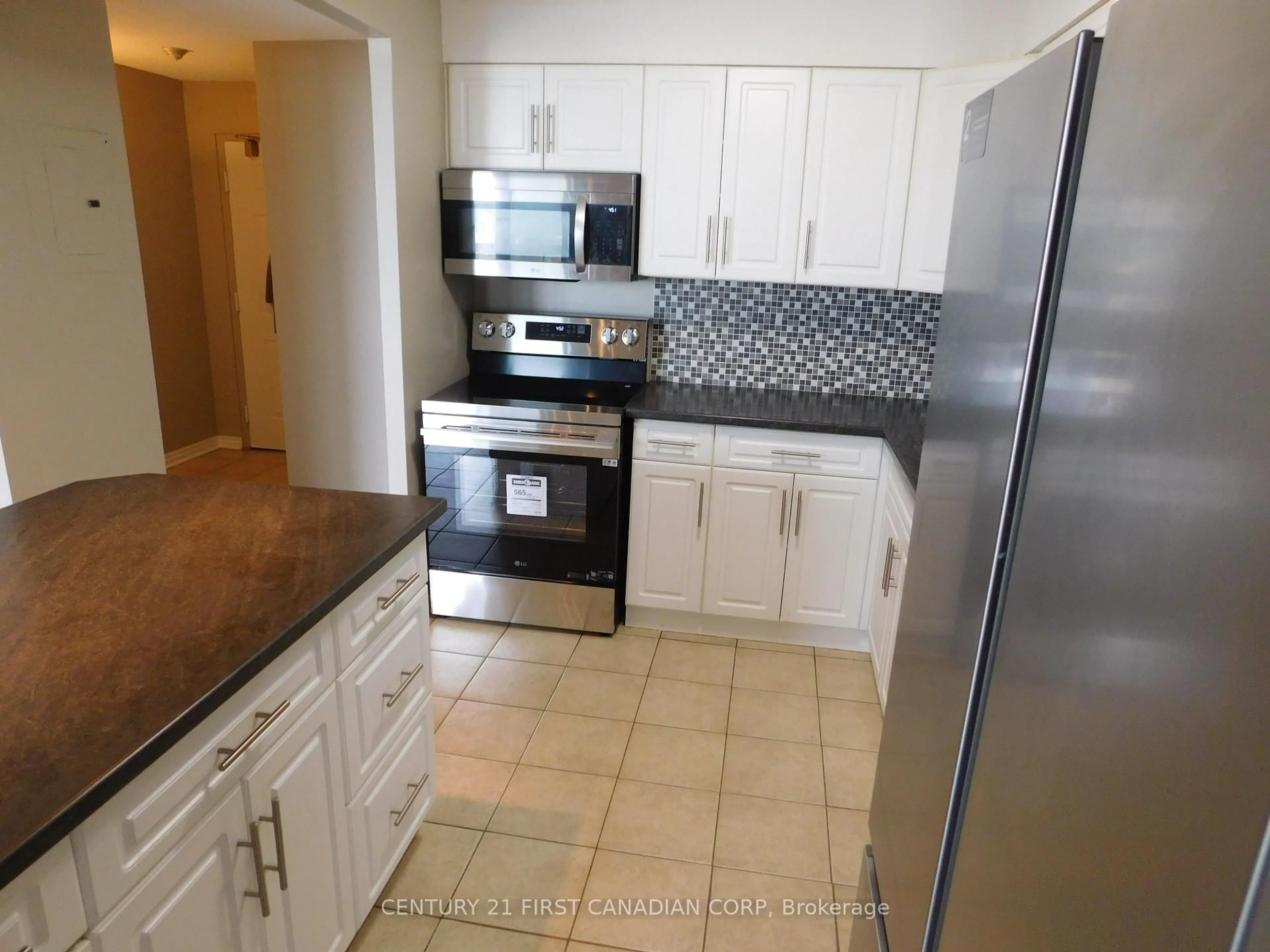 Standard kitchen, ceramic/tile floor for 323 COLBORNE St #2004, London East Ontario N6B 3N8