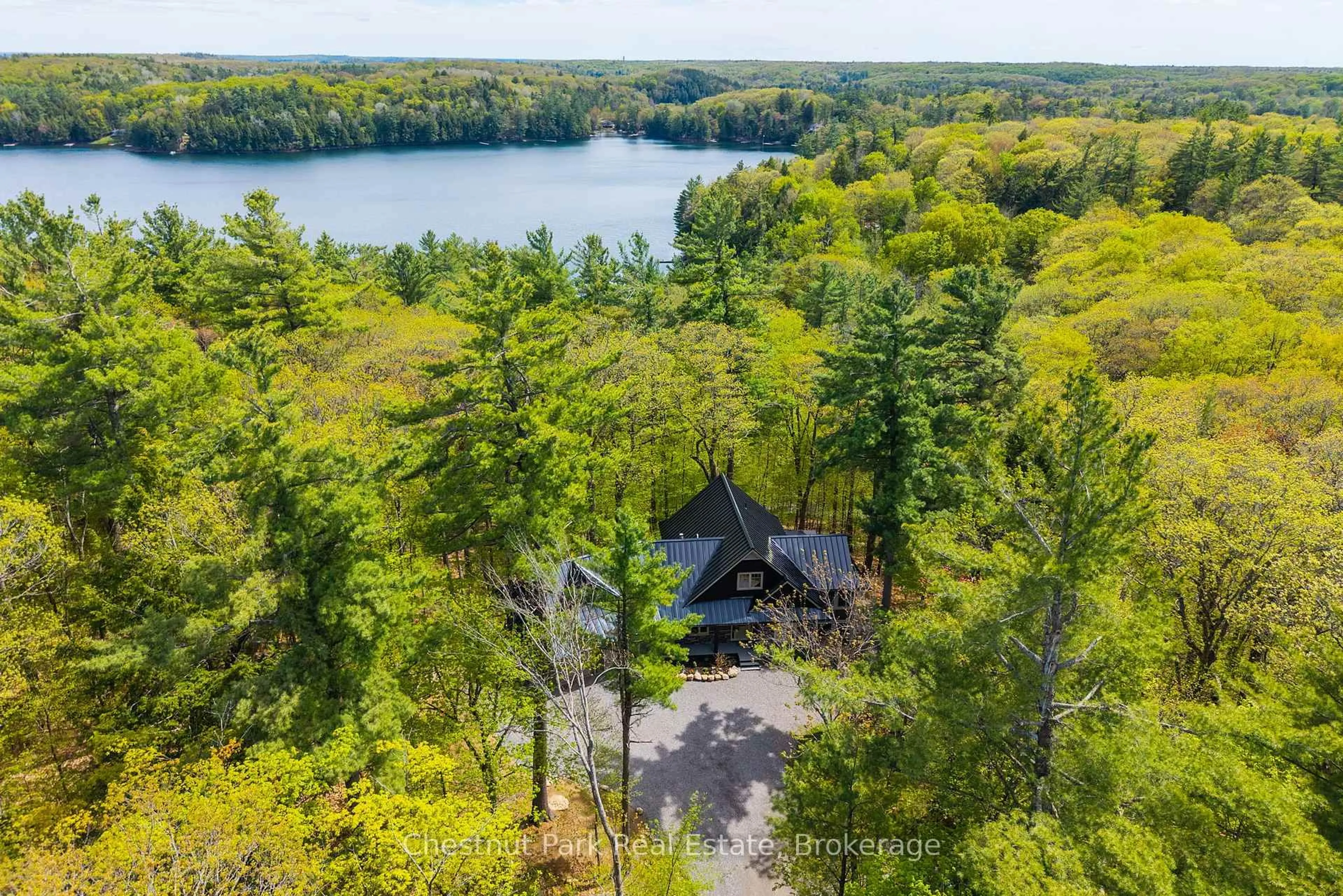 A pic from outside/outdoor area/front of a property/back of a property/a pic from drone, water/lake/river/ocean view for 30 Stephen Rd, Muskoka Lakes Ontario P0B 1J0