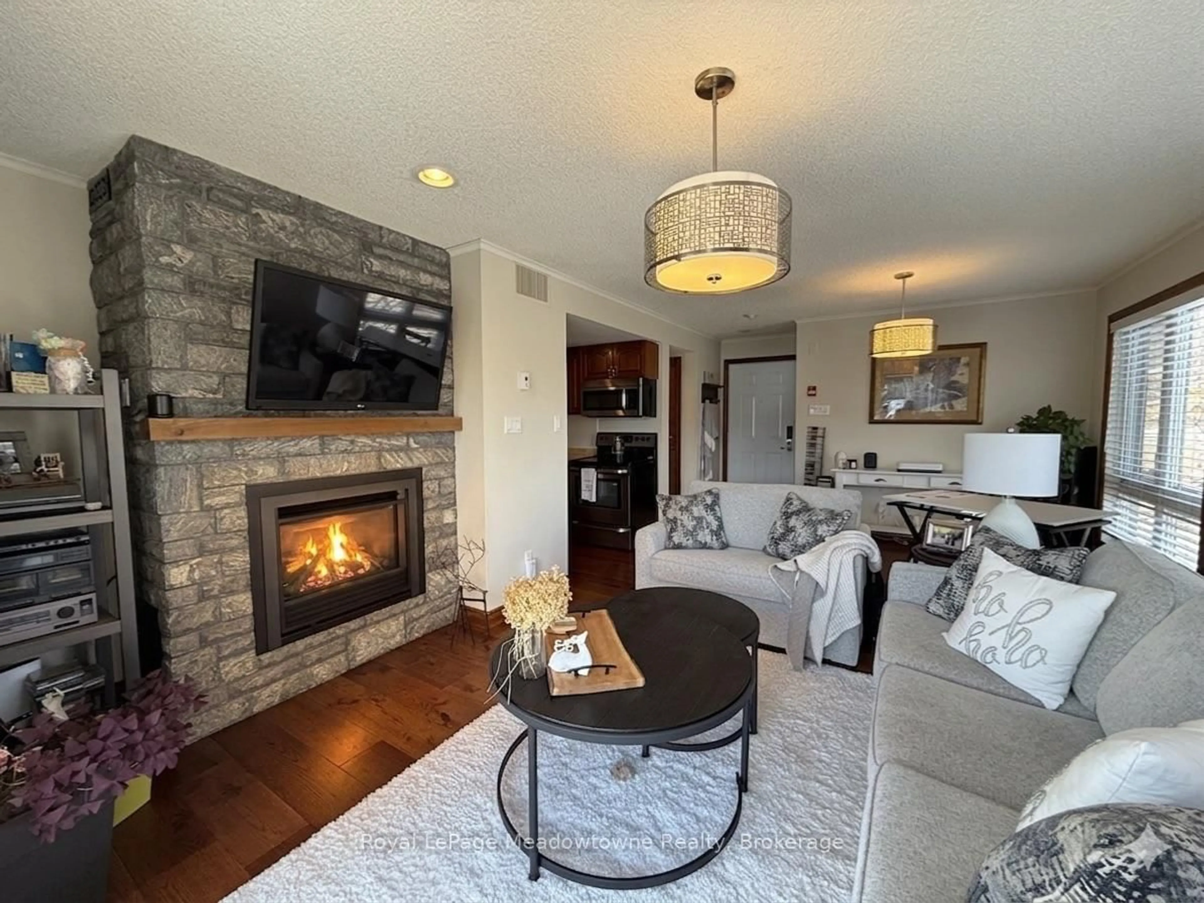 Living room with furniture, unknown for 34 Deerhurst Greens Rd #301, Huntsville Ontario P1H 1A9