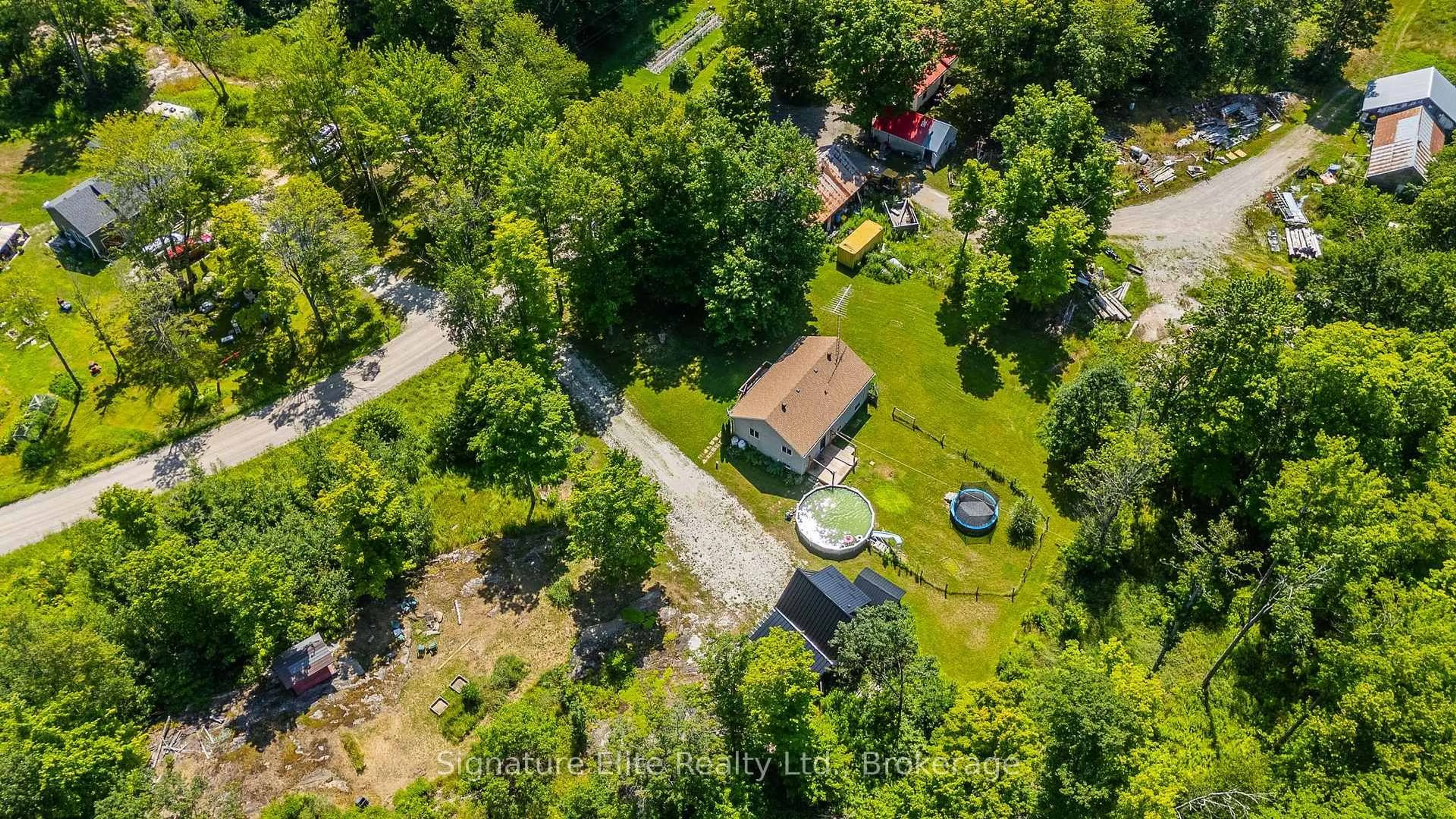 A pic from outside/outdoor area/front of a property/back of a property/a pic from drone, forest/trees view for 137 Morton Lane, Kawartha Lakes Ontario L0K 1W0