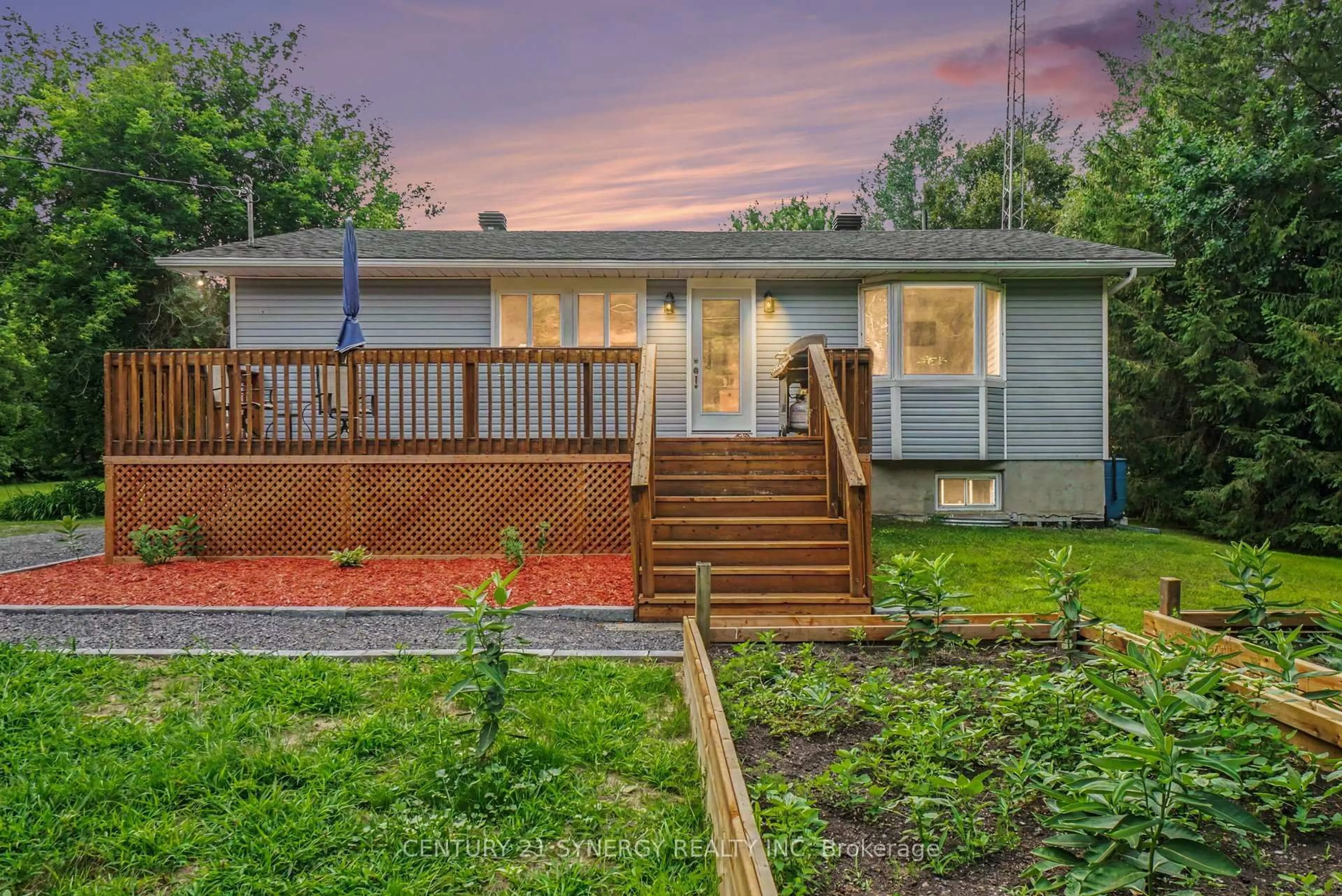 Home with vinyl exterior material, street for 1409 Baker Rd, The Nation Ontario K0A 1M0