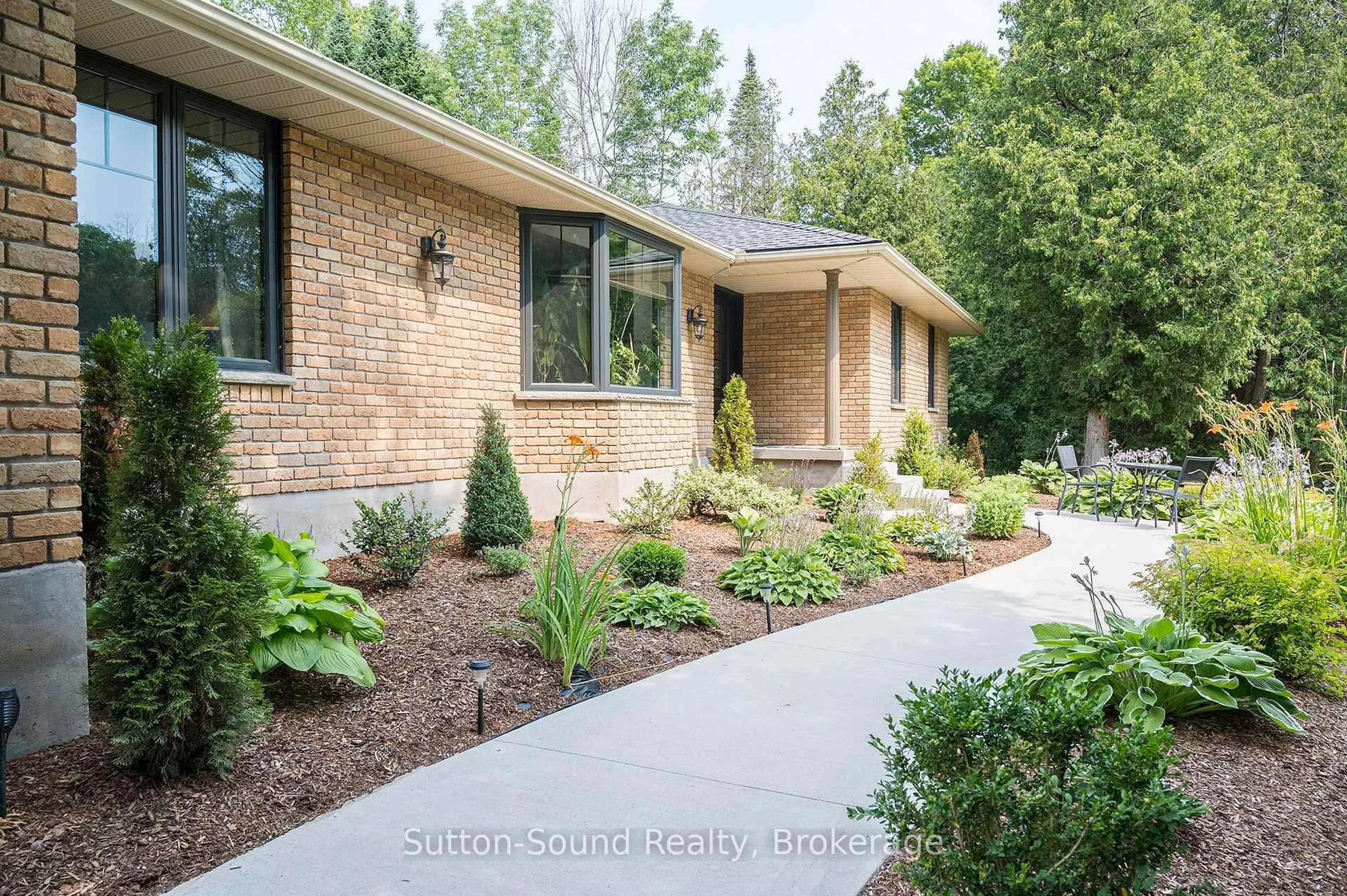 Home with brick exterior material, street for 286 Balmy Beach Rd, Georgian Bluffs Ontario N4K 5N4