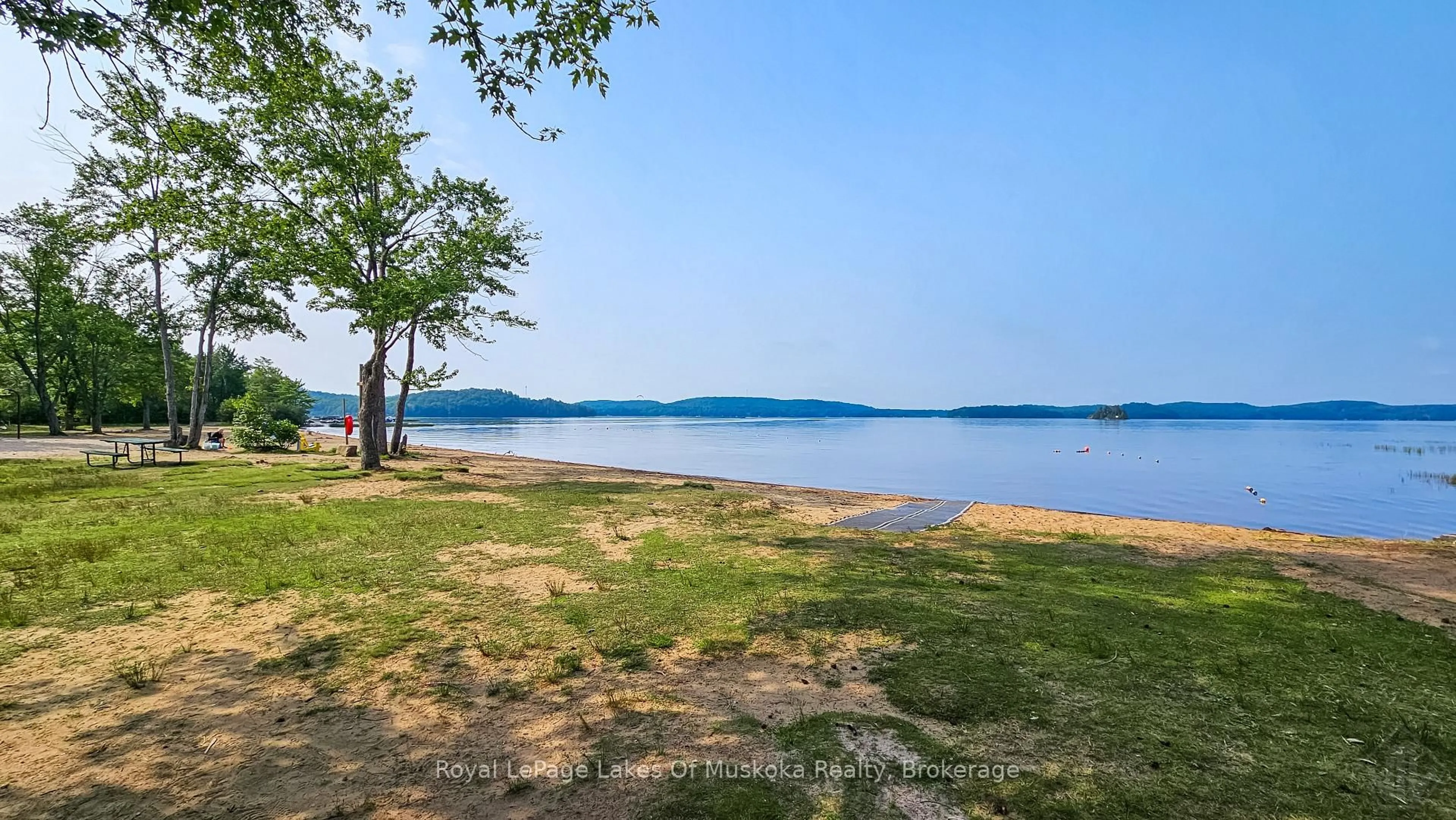 Patio, water/lake/river/ocean view for 91 Hutcheson Beach Rd, Huntsville Ontario P1H 1N4