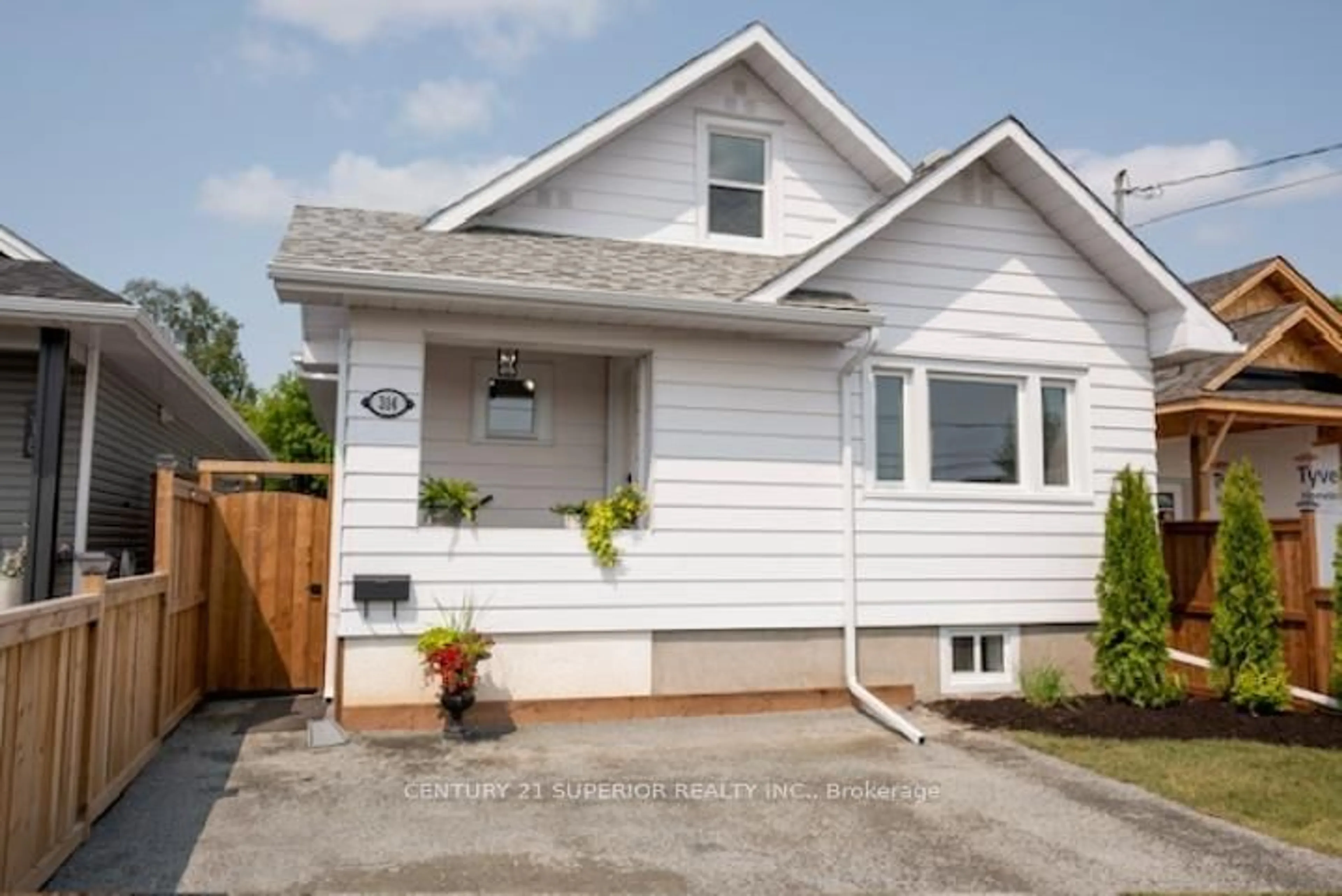 Home with vinyl exterior material, street for 314 Surrey Street, Thunder Bay Ontario P7A 1J9