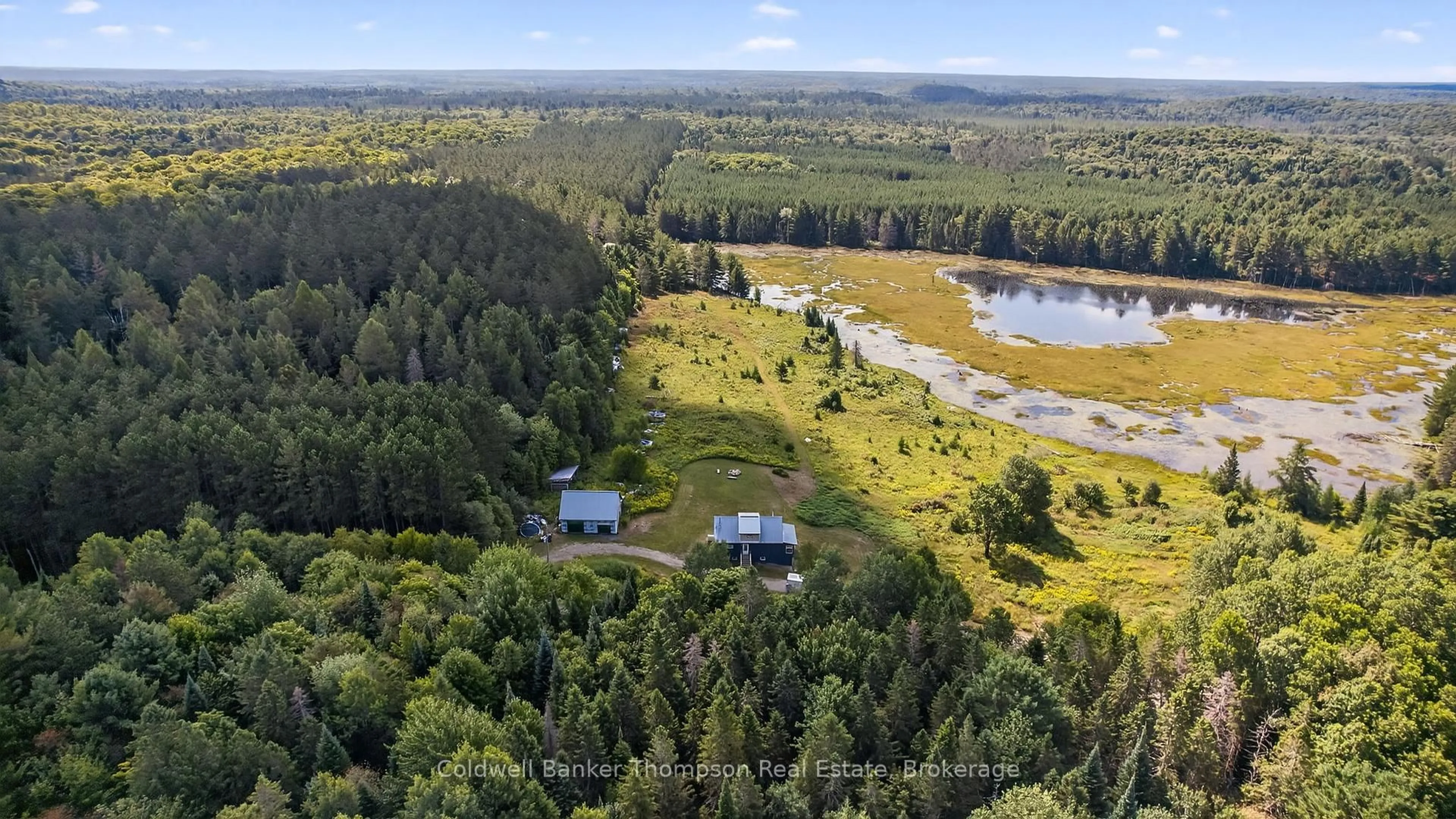 A pic from outside/outdoor area/front of a property/back of a property/a pic from drone, water/lake/river/ocean view for 193 Yearly Community Centre Rd, Huntsville Ontario P0B 1M0
