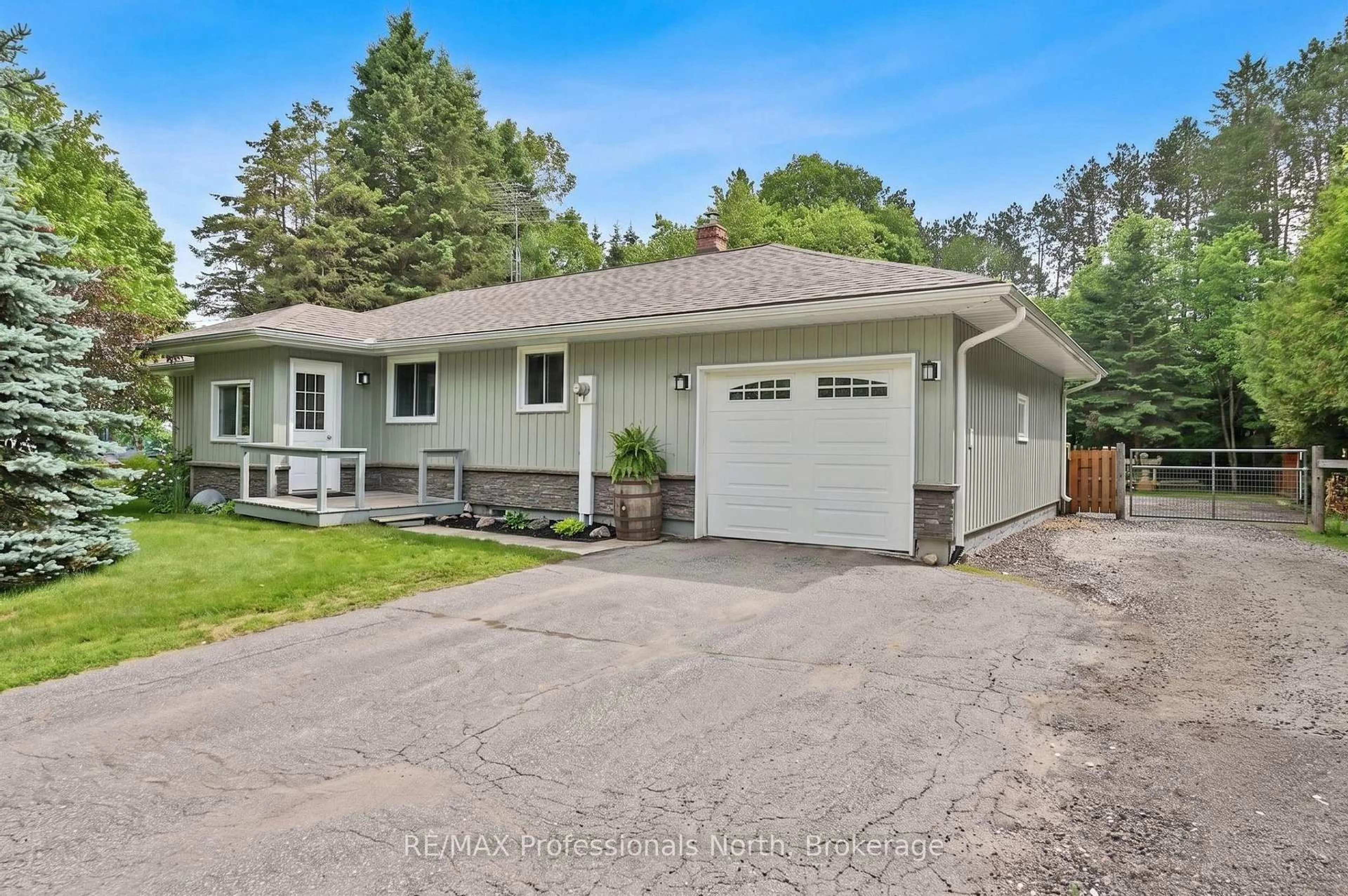 Home with vinyl exterior material, street for 12 Stouffer St, Minden Hills Ontario K0M 2K0