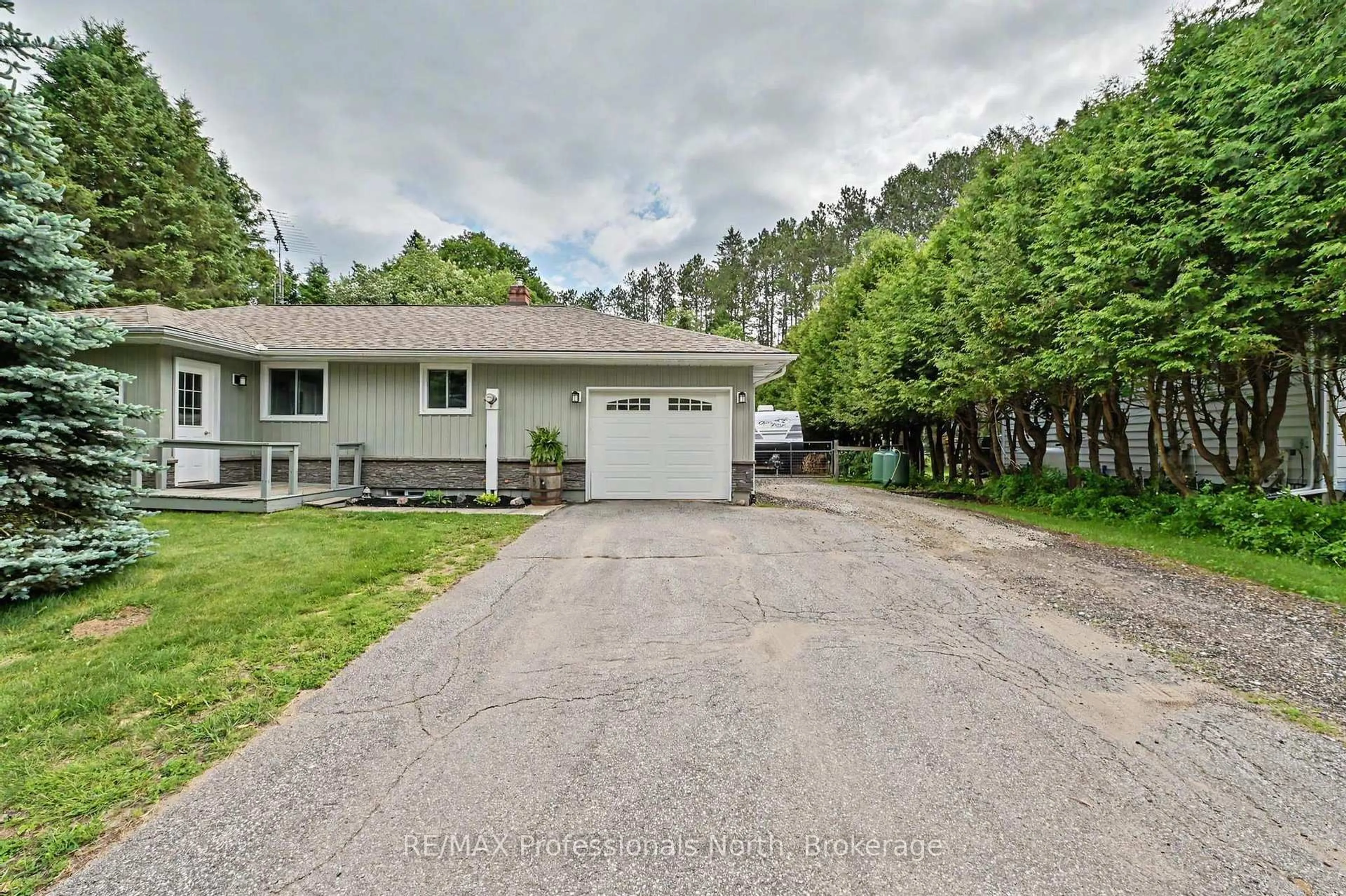 A pic from outside/outdoor area/front of a property/back of a property/a pic from drone, street for 12 Stouffer St, Minden Hills Ontario K0M 2K0
