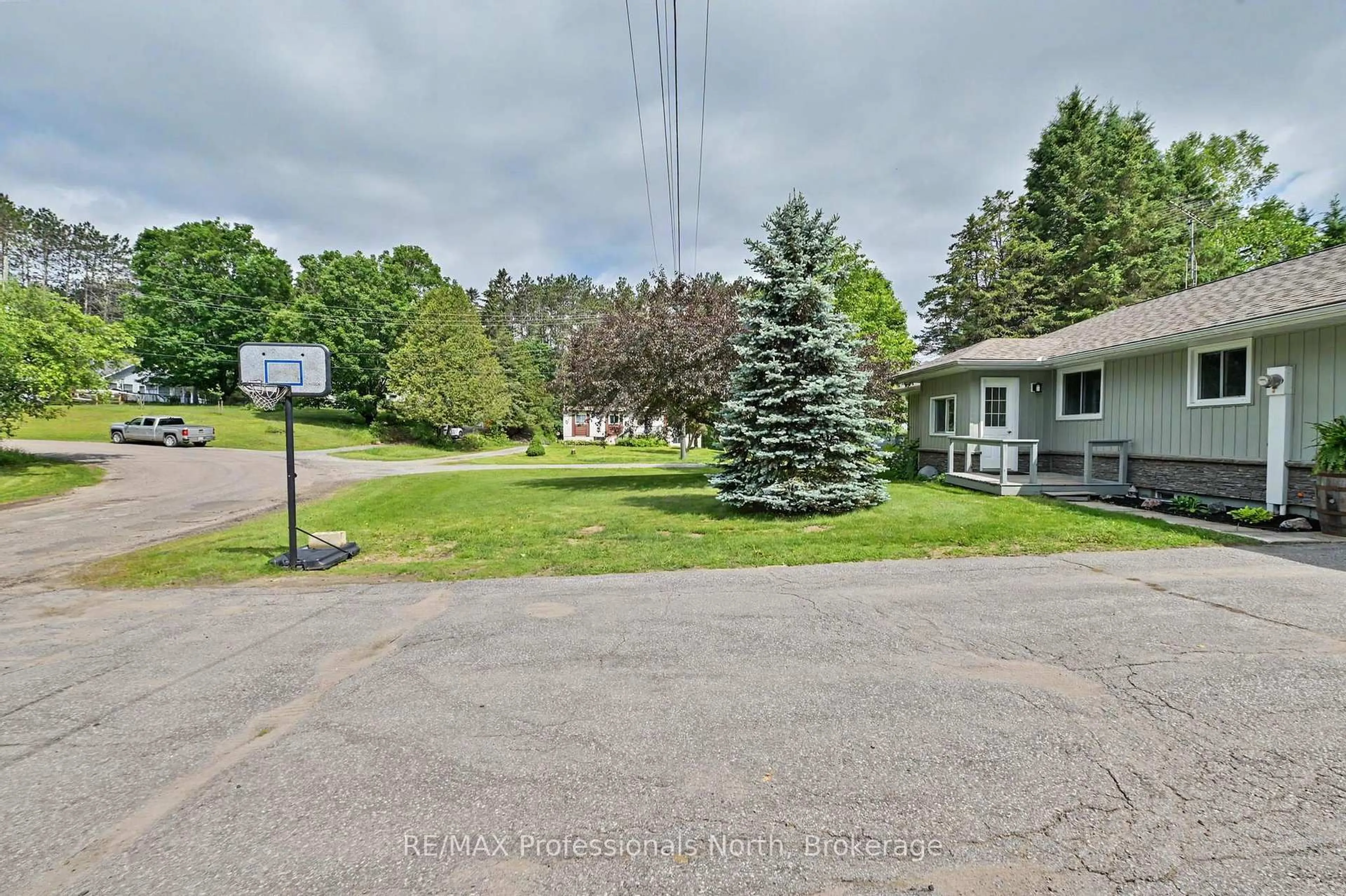 A pic from outside/outdoor area/front of a property/back of a property/a pic from drone, unknown for 12 Stouffer St, Minden Hills Ontario K0M 2K0