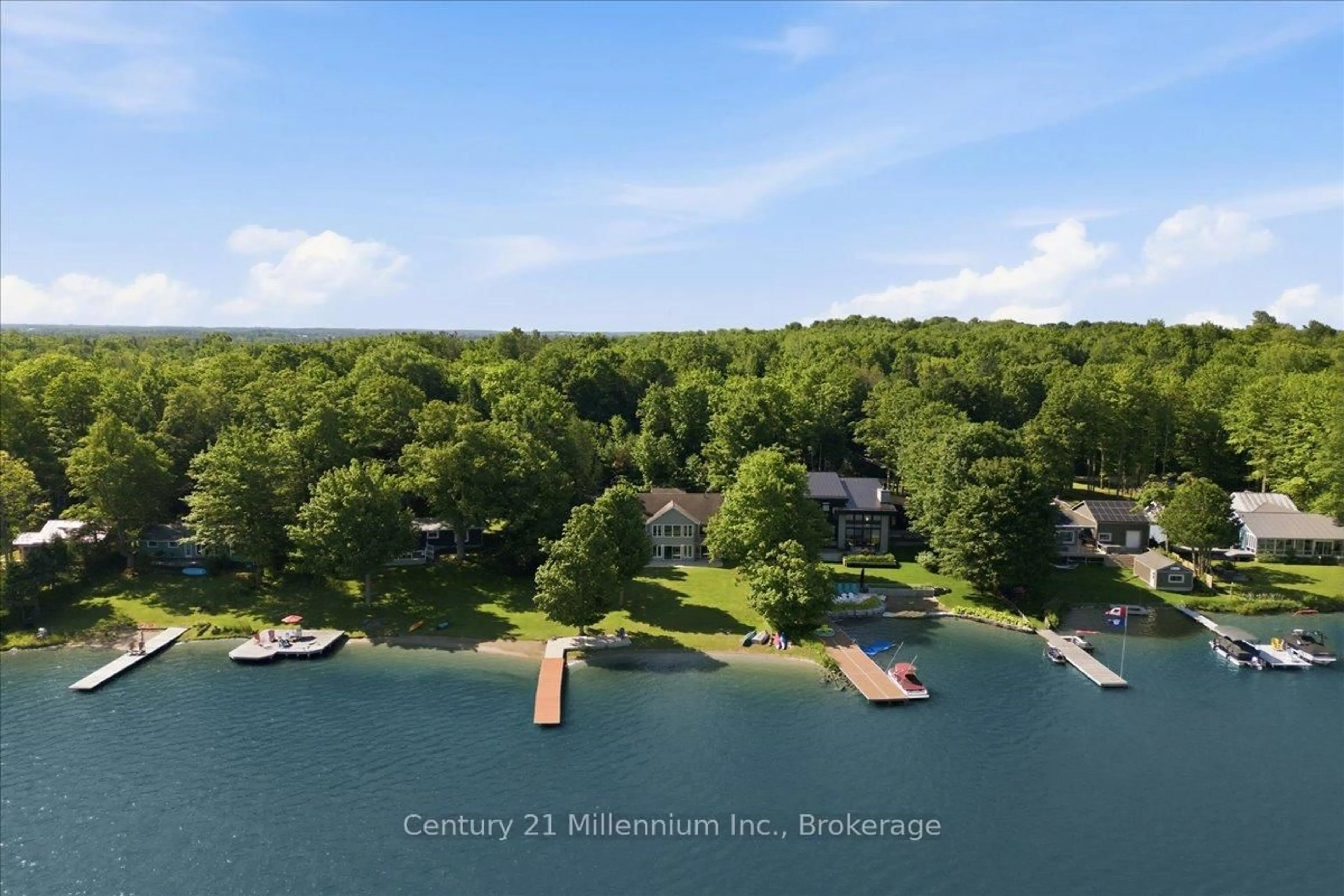 A pic from outside/outdoor area/front of a property/back of a property/a pic from drone, water/lake/river/ocean view for 115 South Shores Rd, Grey Highlands Ontario N0C 1E0