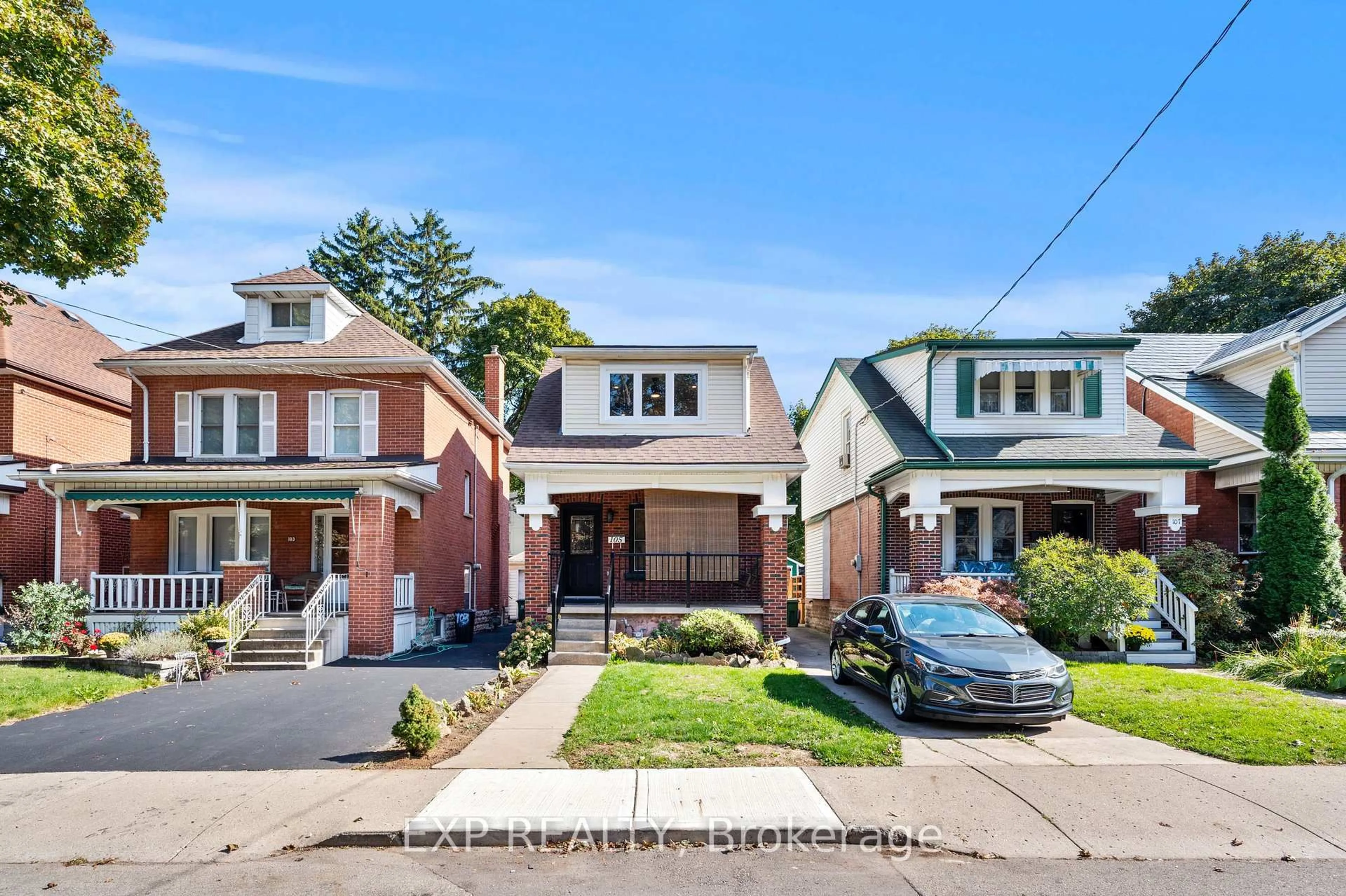 Home with brick exterior material, street for 105 Rothsay Ave, Hamilton Ontario L8M 3G3