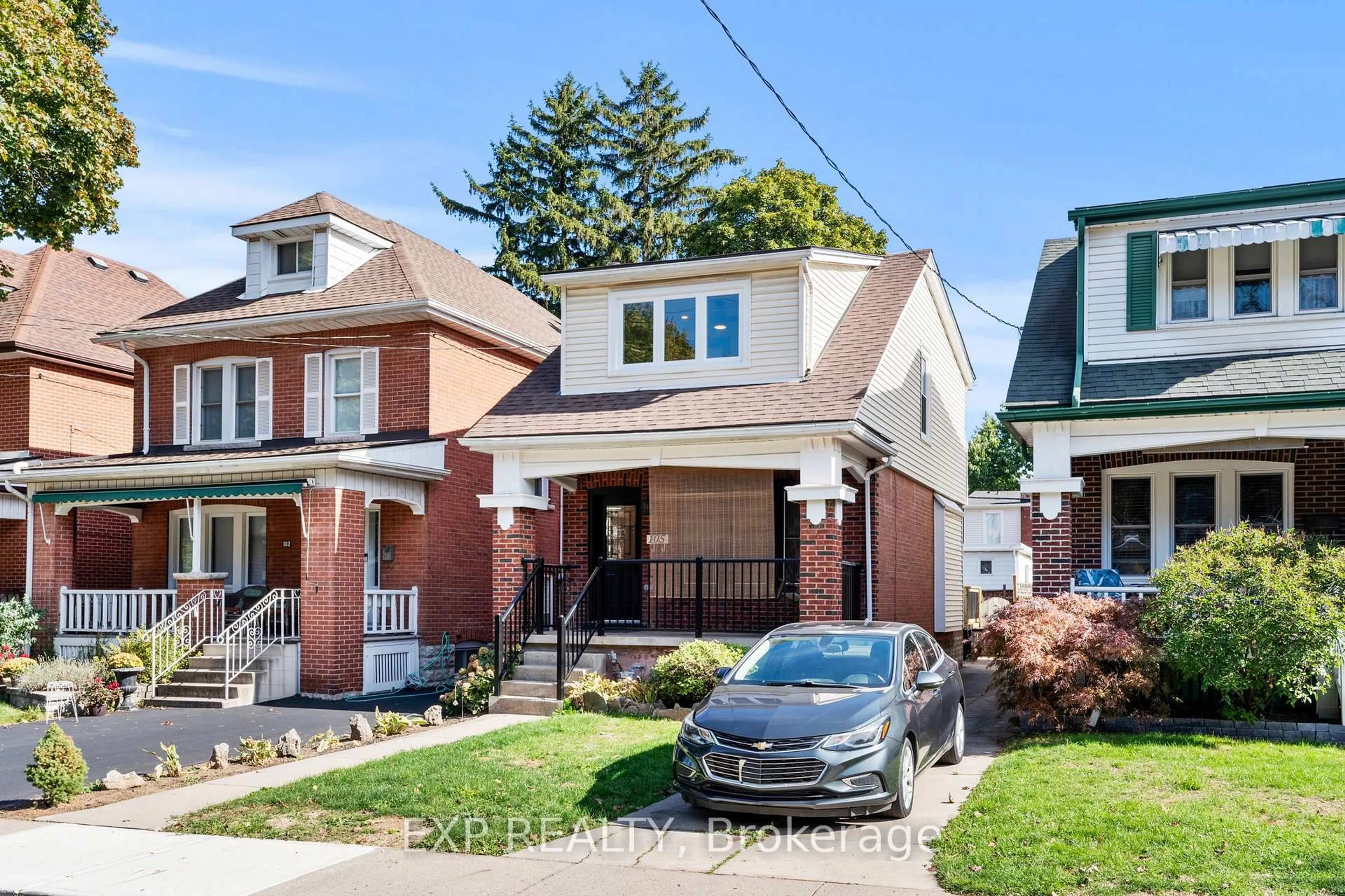 Home with brick exterior material, street for 105 Rothsay Ave, Hamilton Ontario L8M 3G3
