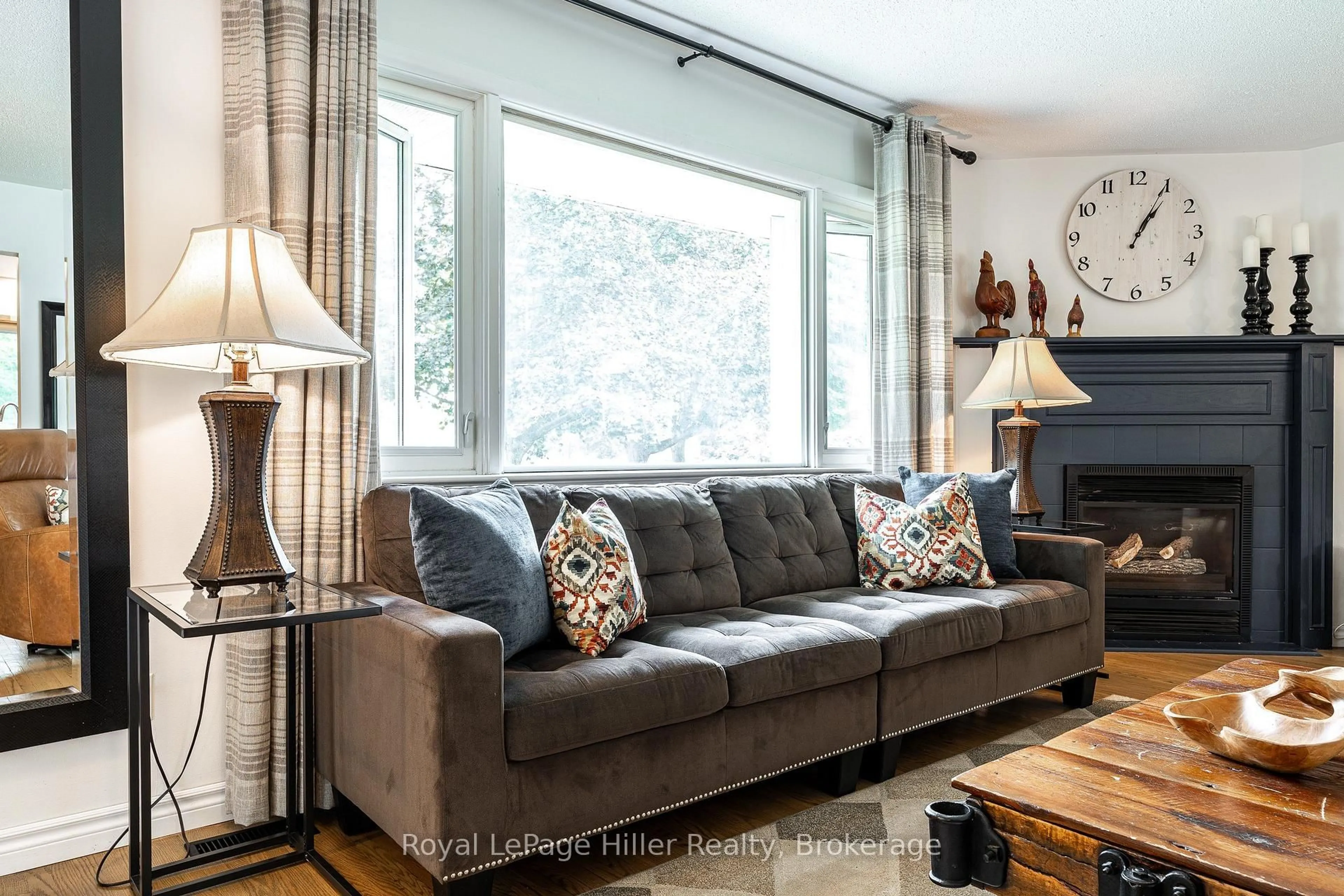 Living room with furniture, wood/laminate floor for 7 Waddell St, Stratford Ontario N5A 6K5