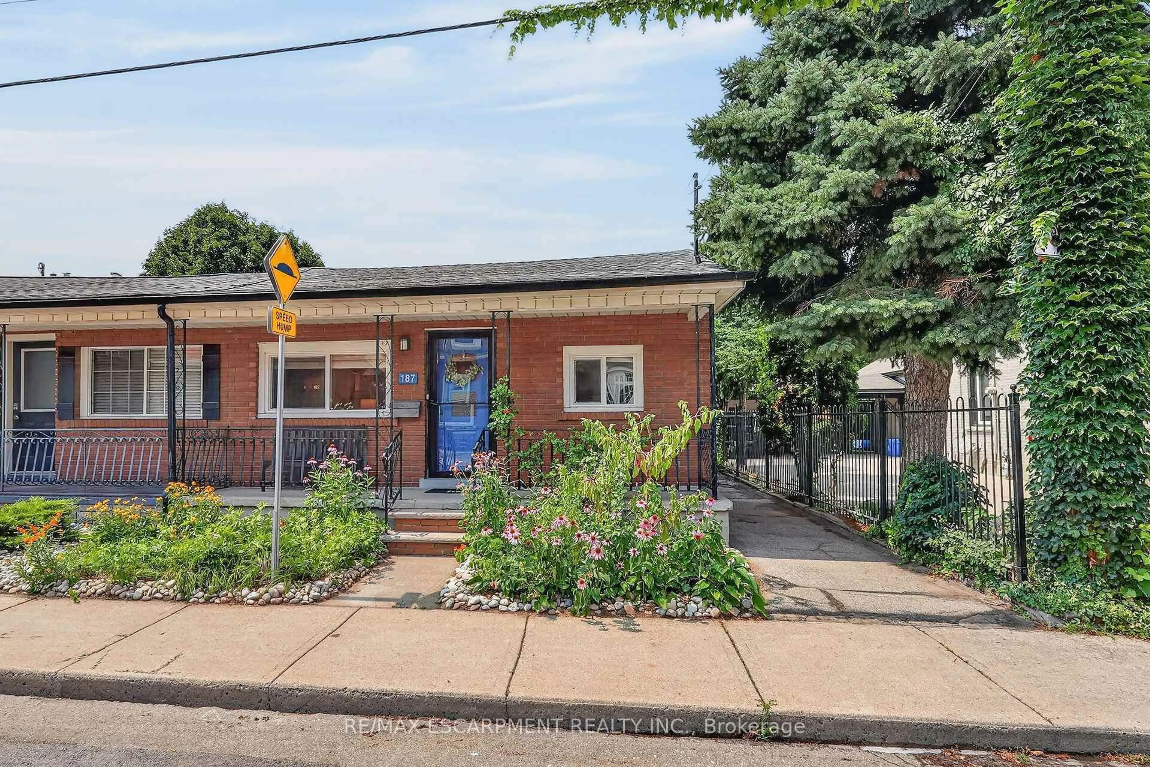 Home with brick exterior material, street for 187 Ray St, Hamilton Ontario L8R 2Y3