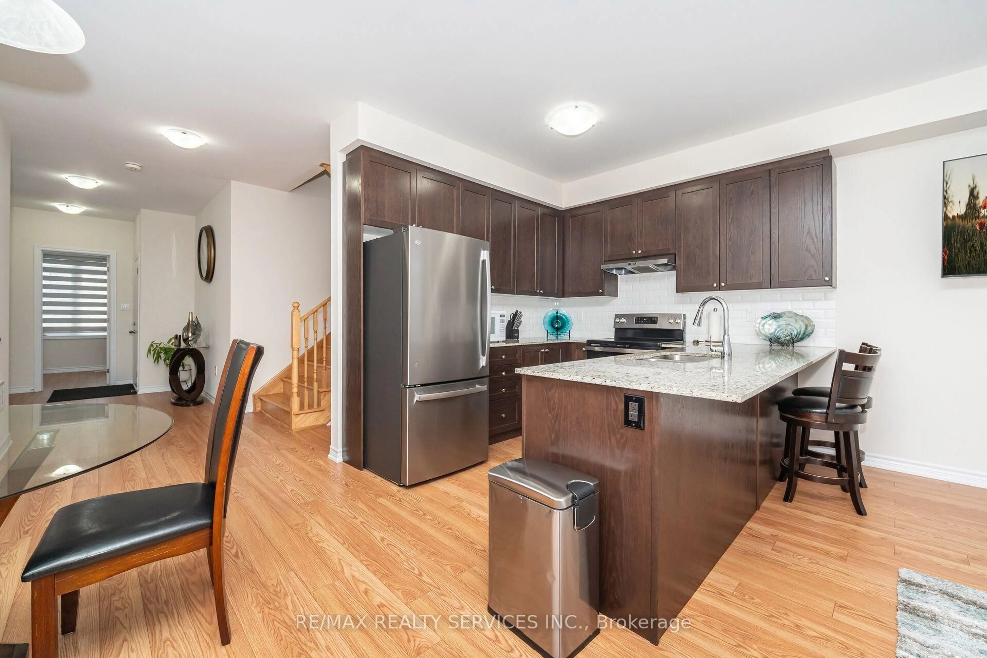 Open concept kitchen, wood/laminate floor for 10 Conboy Dr, Erin Ontario N0B 1T0
