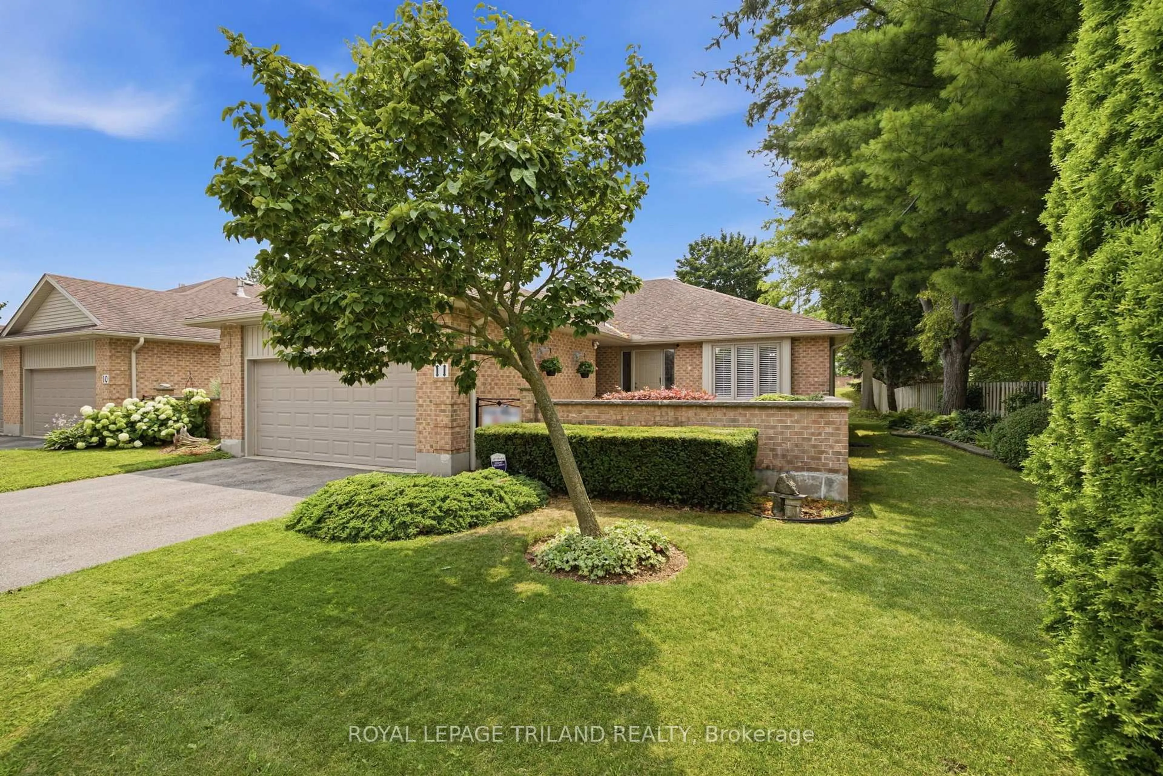 A pic from outside/outdoor area/front of a property/back of a property/a pic from drone, street for 5 Cadeau Terr #11, London South Ontario N6K 4H1