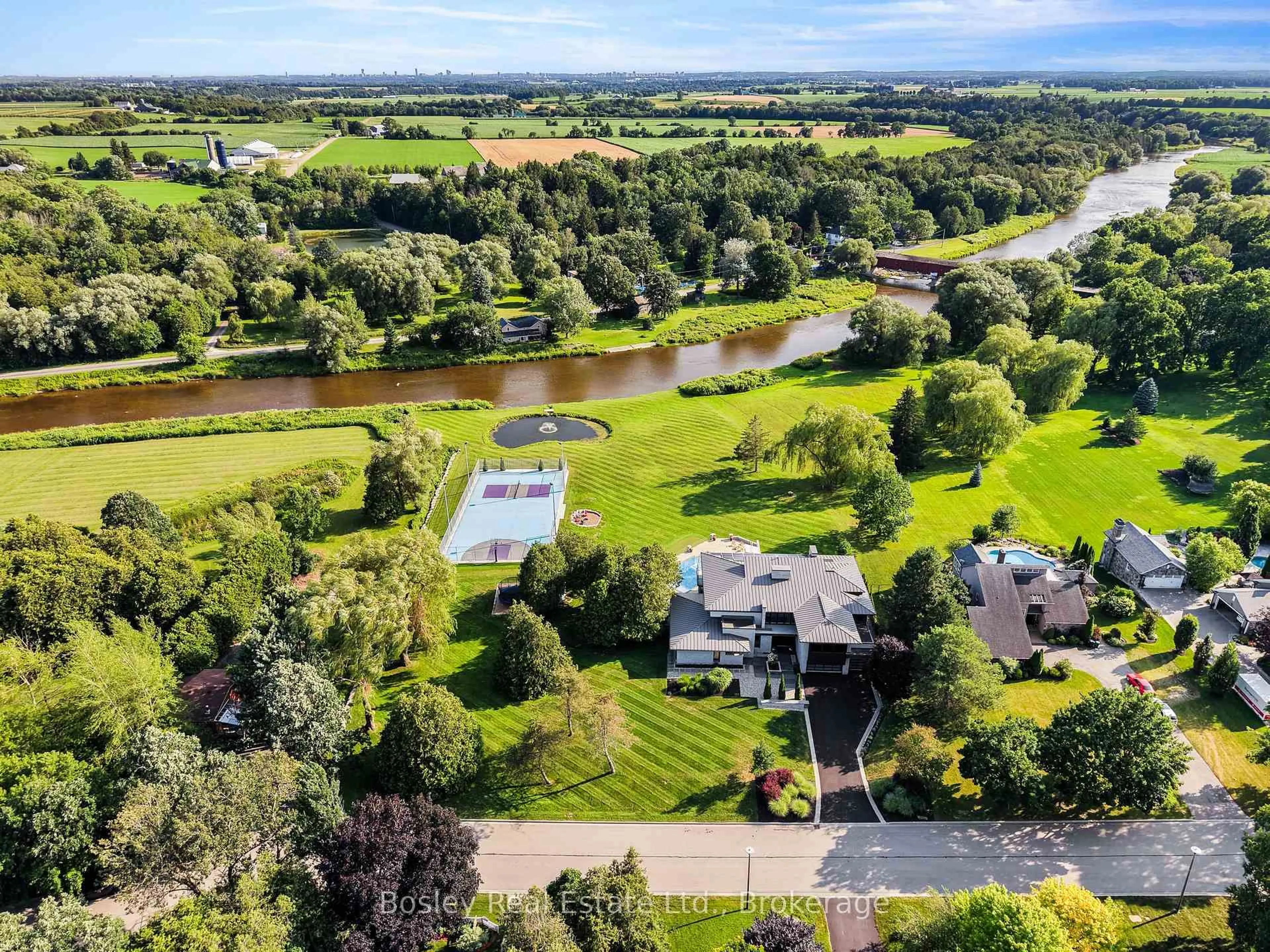 A pic from outside/outdoor area/front of a property/back of a property/a pic from drone, water/lake/river/ocean view for 29 Tallwood Dr, Woolwich Ontario N0B 2V0