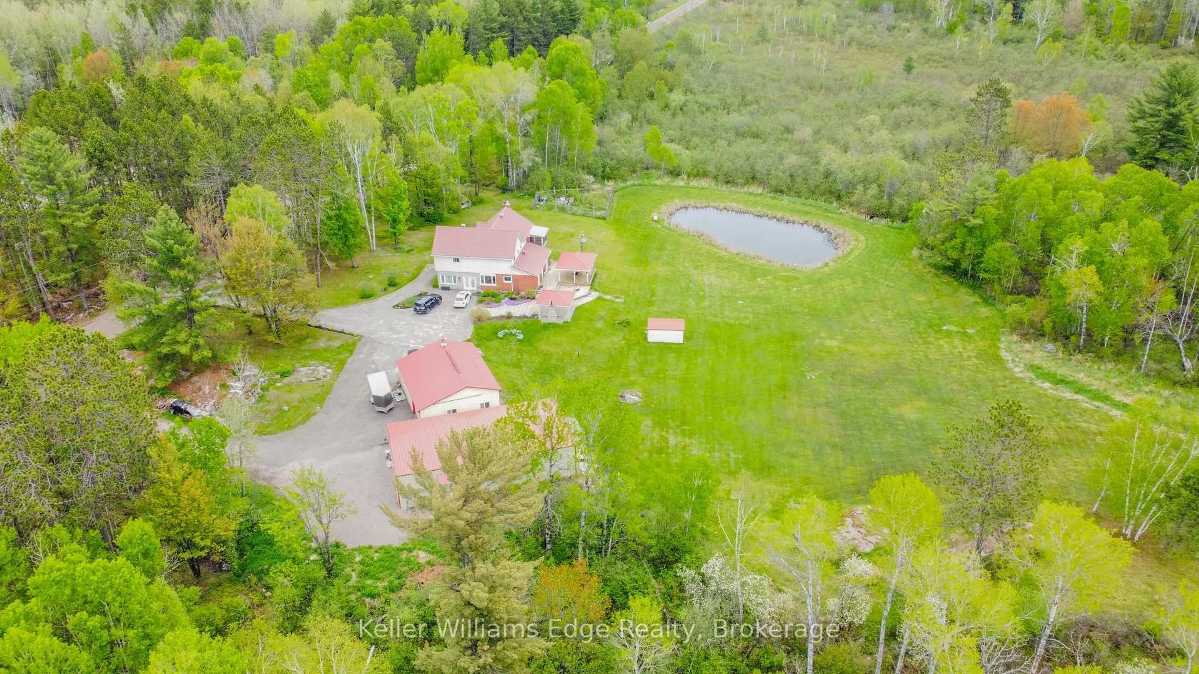 A pic from outside/outdoor area/front of a property/back of a property/a pic from drone, unknown for 89 HILLS SIDING Rd, Callander Ontario P0H 1H0