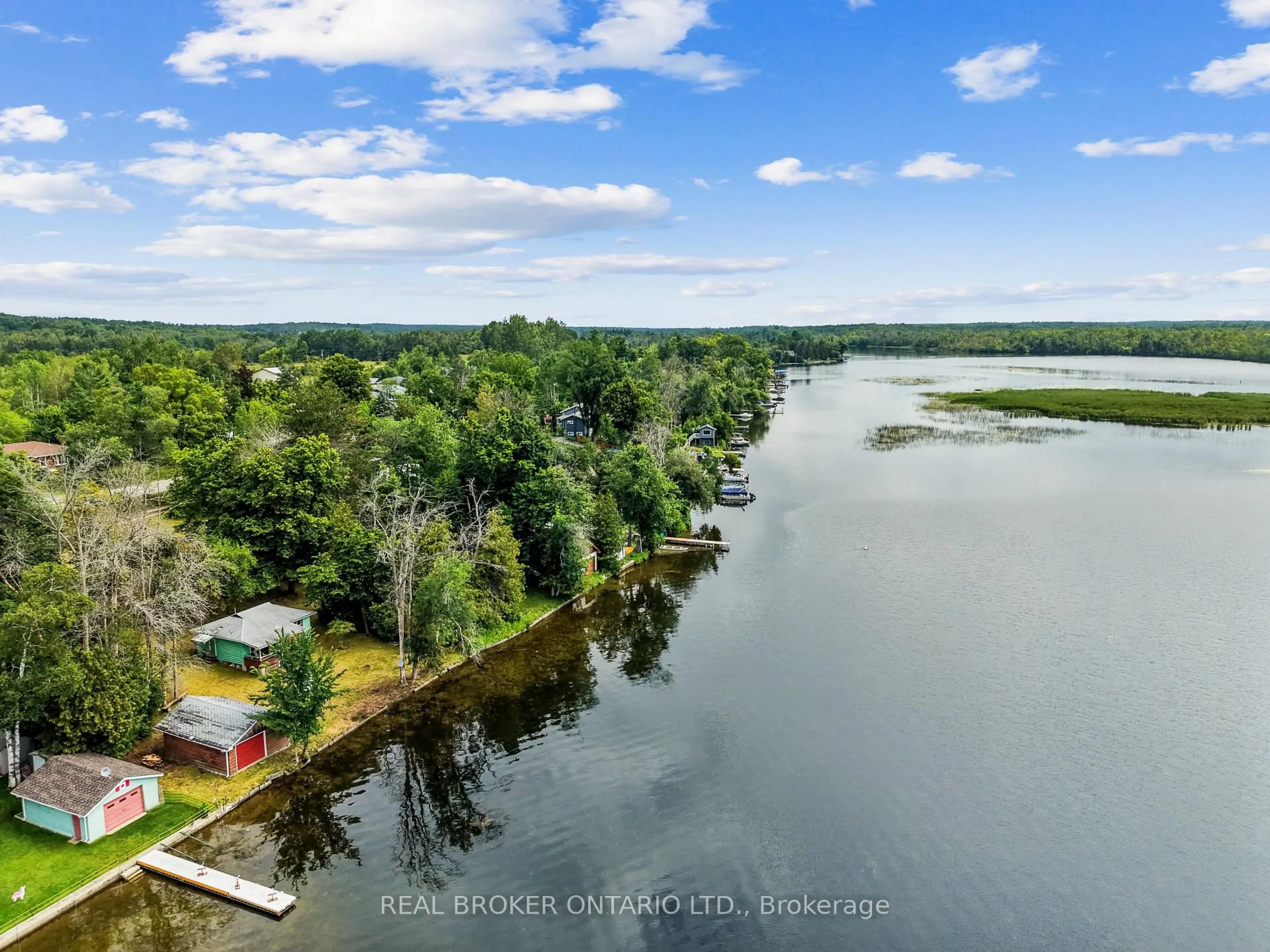 A pic from outside/outdoor area/front of a property/back of a property/a pic from drone, water/lake/river/ocean view for 1839 Young's Point Rd, Selwyn Ontario K0L 2H0