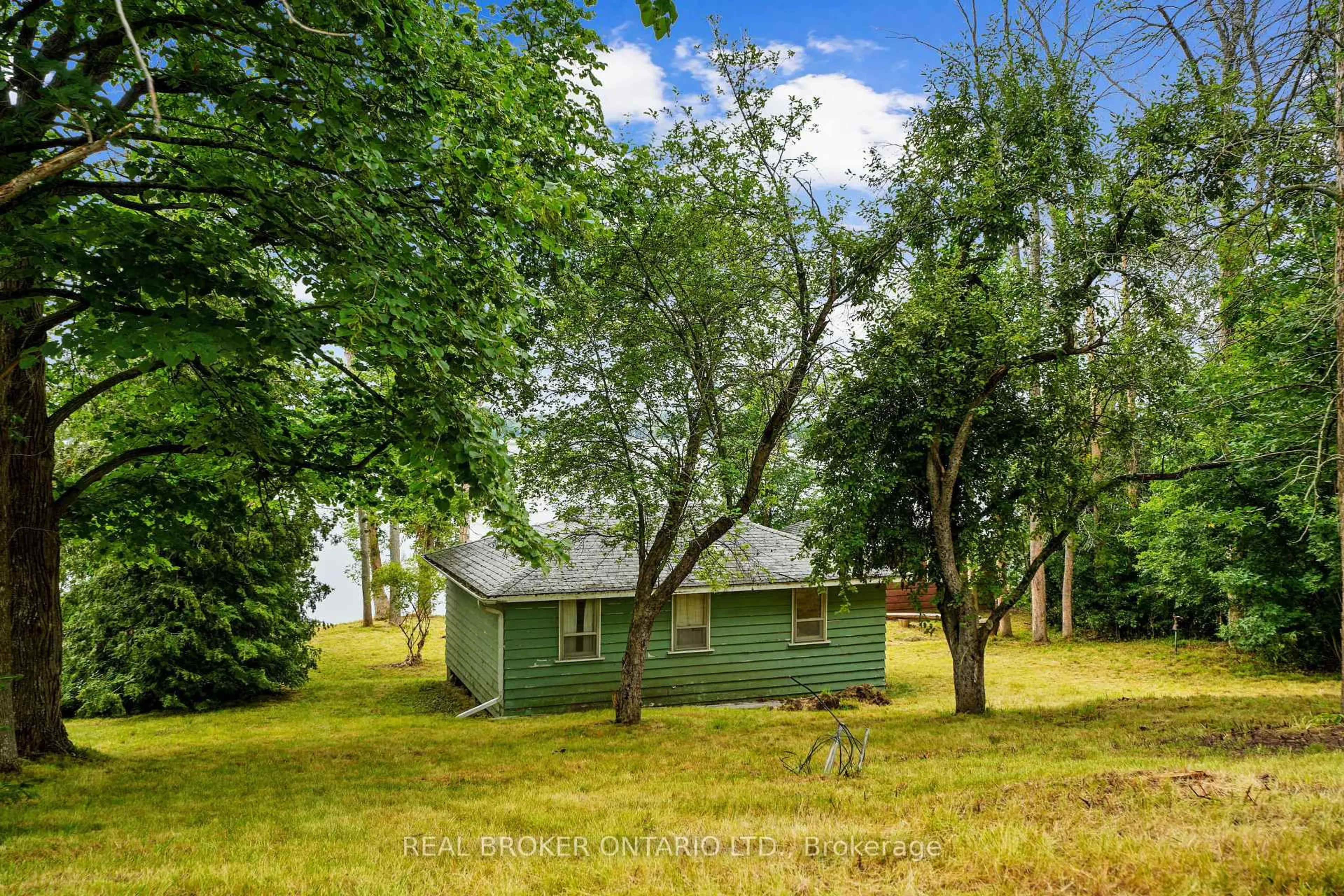 A pic from outside/outdoor area/front of a property/back of a property/a pic from drone, forest/trees view for 1839 Young's Point Rd, Selwyn Ontario K0L 2H0