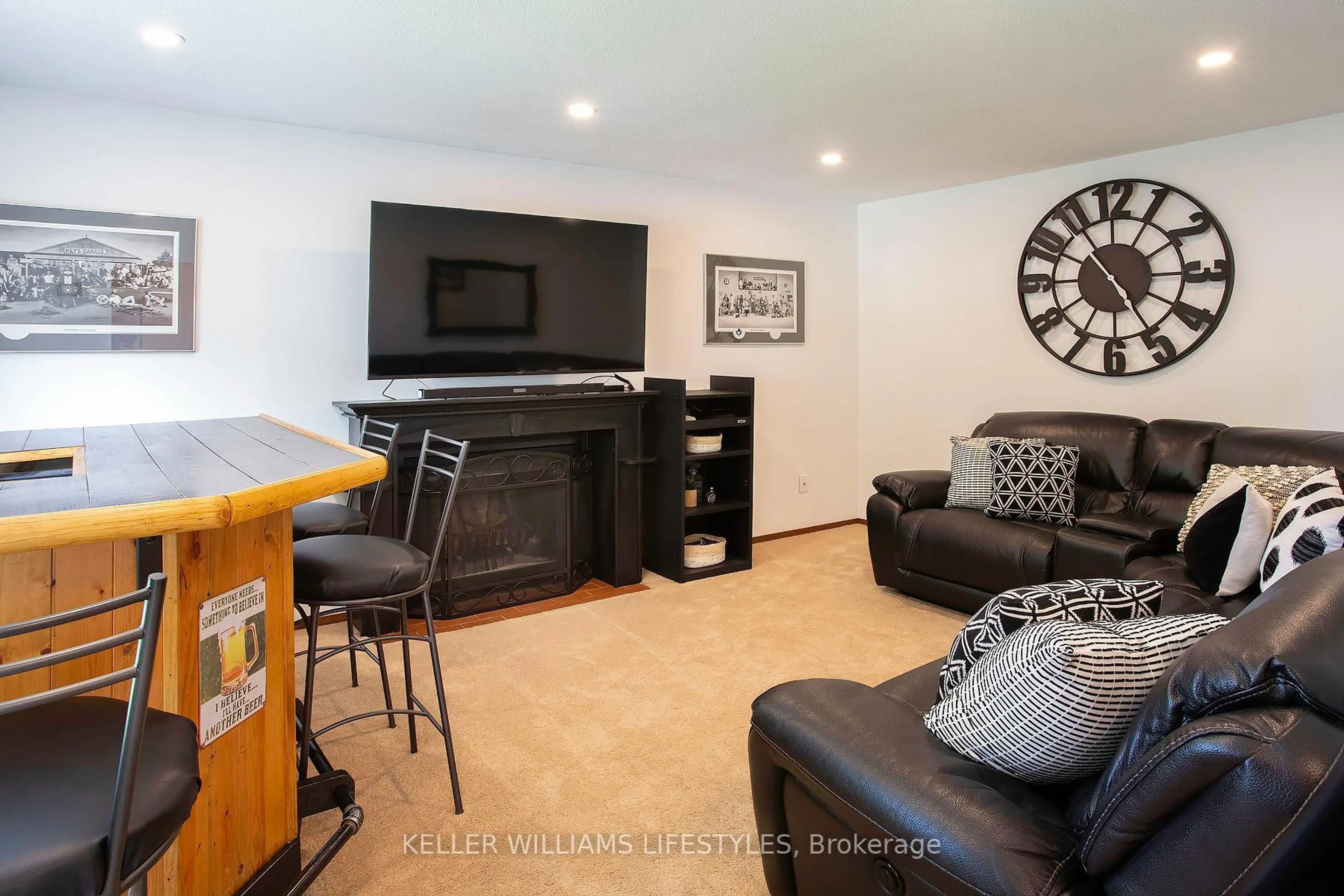 Living room with furniture, wood/laminate floor for 373 Blackacres Blvd, London North Ontario N6G 3E5