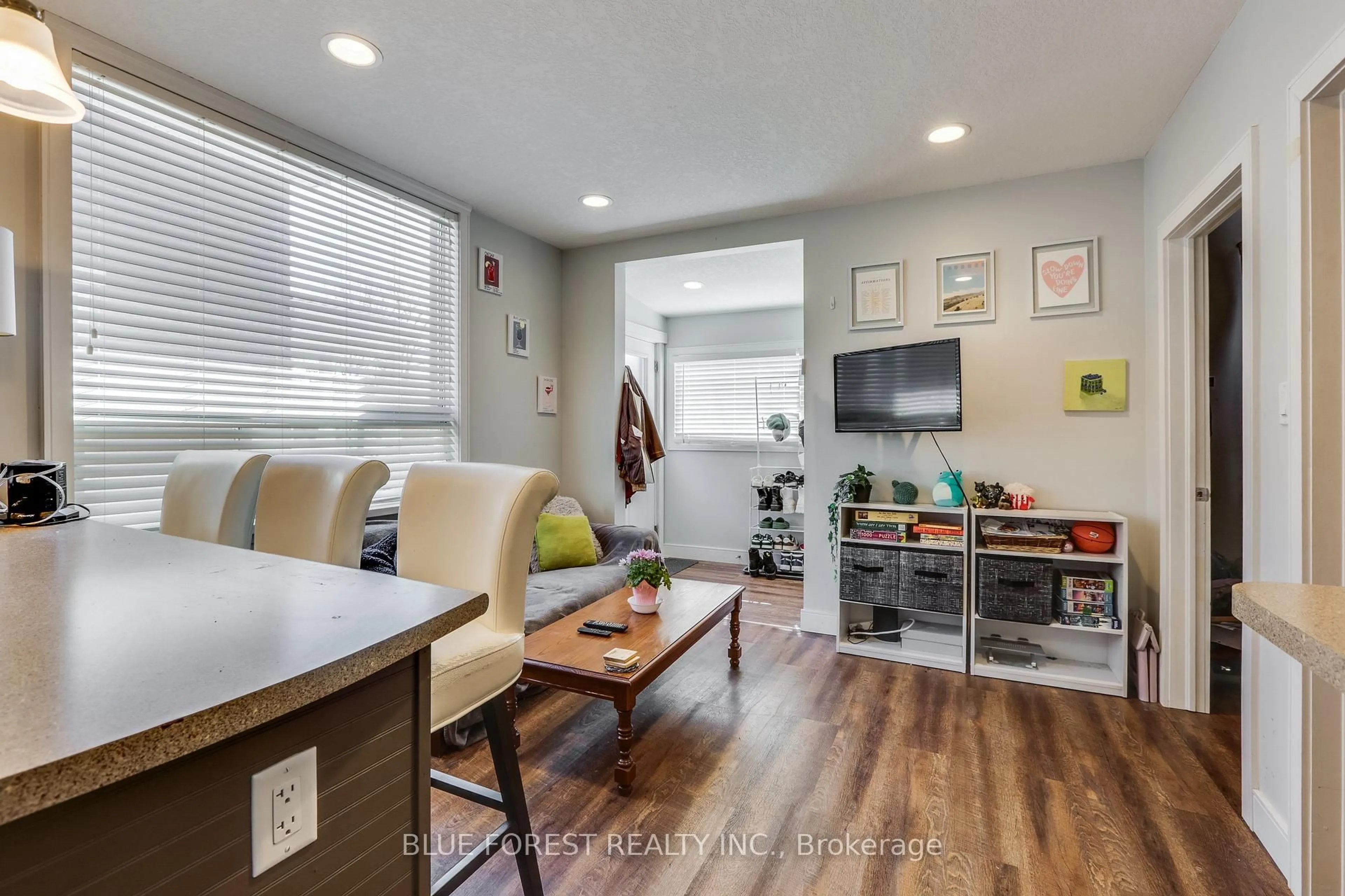 Living room with furniture, wood/laminate floor for 17 McDonald Ave, London North Ontario N6G 1A9
