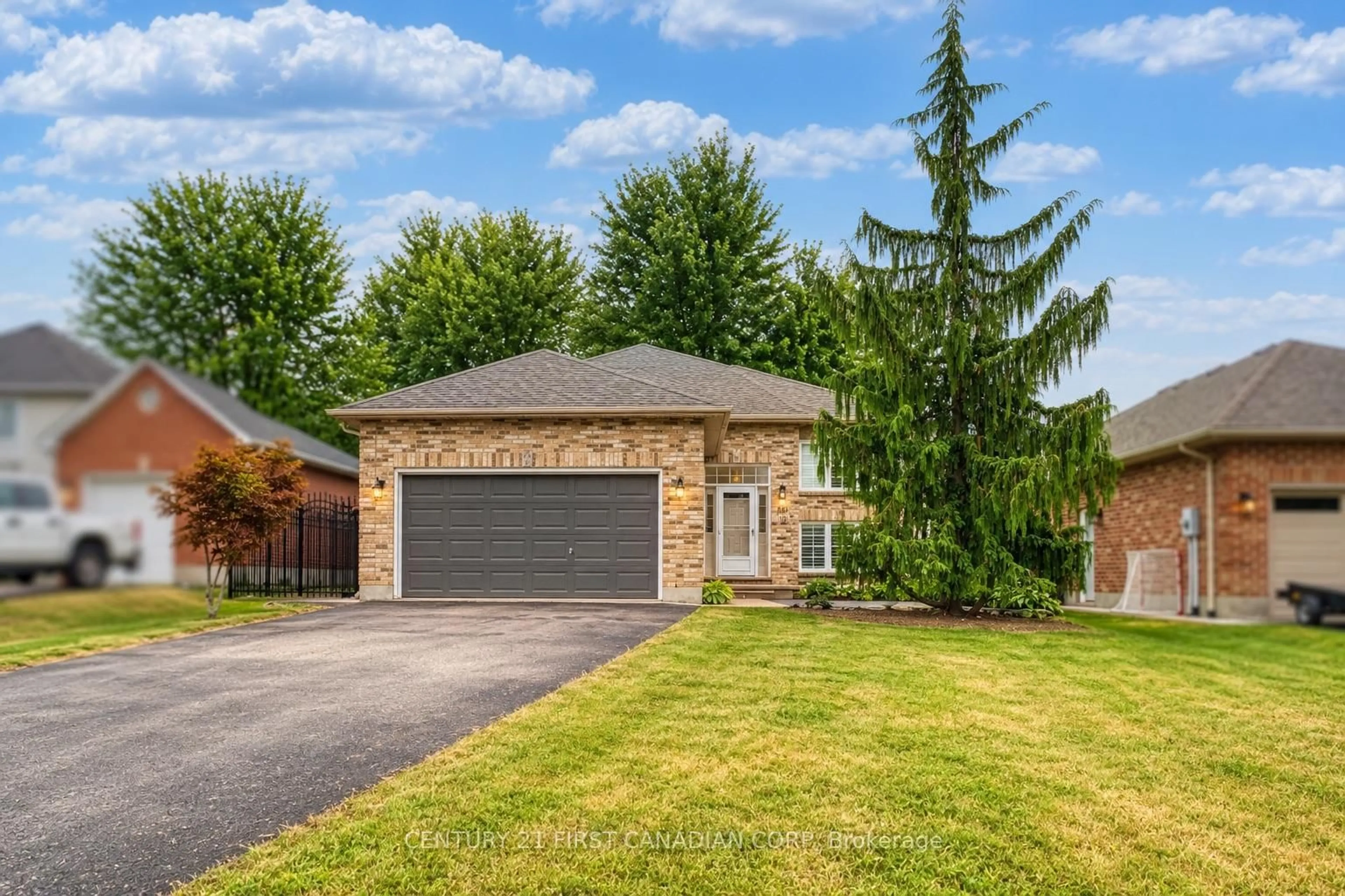 Home with brick exterior material, street for 189 GIBSON Cres, Lucan Biddulph Ontario N0M 2J0