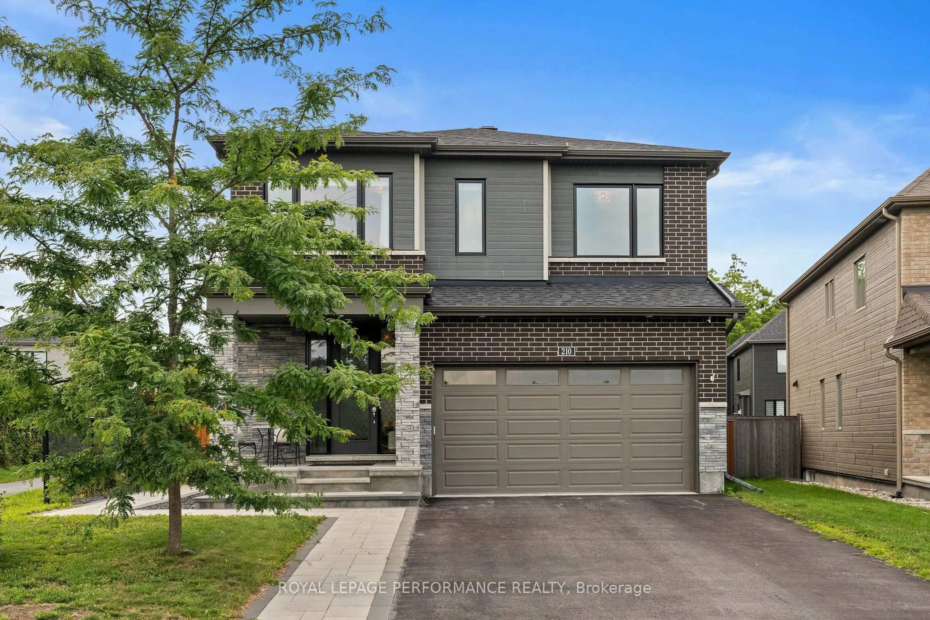 Home with brick exterior material, street for 210 Spindrift Circ, Manotick Ontario K4M 1J8