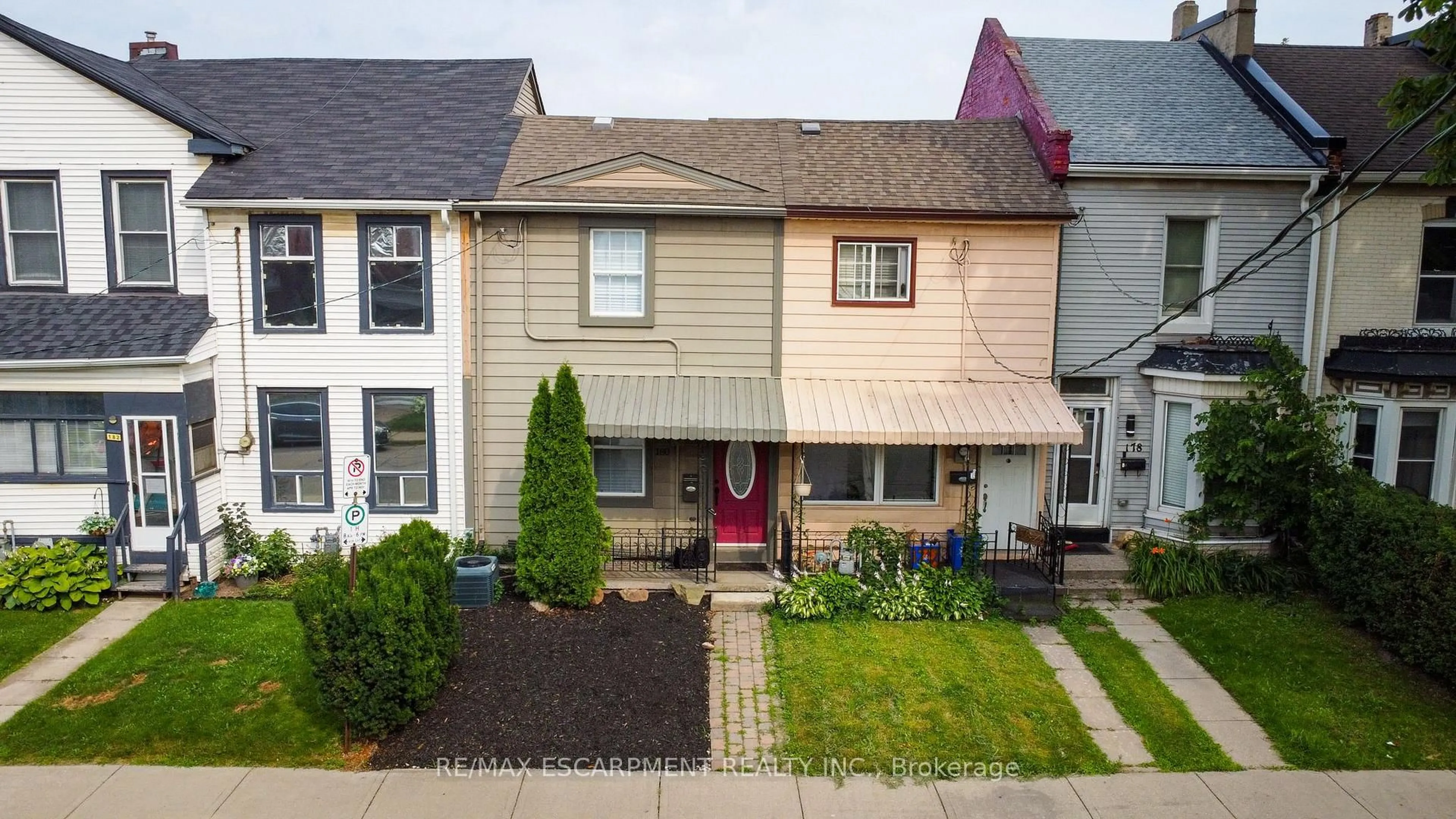 A pic from outside/outdoor area/front of a property/back of a property/a pic from drone, street for 180 WEST Ave, Hamilton Ontario L8L 5C6