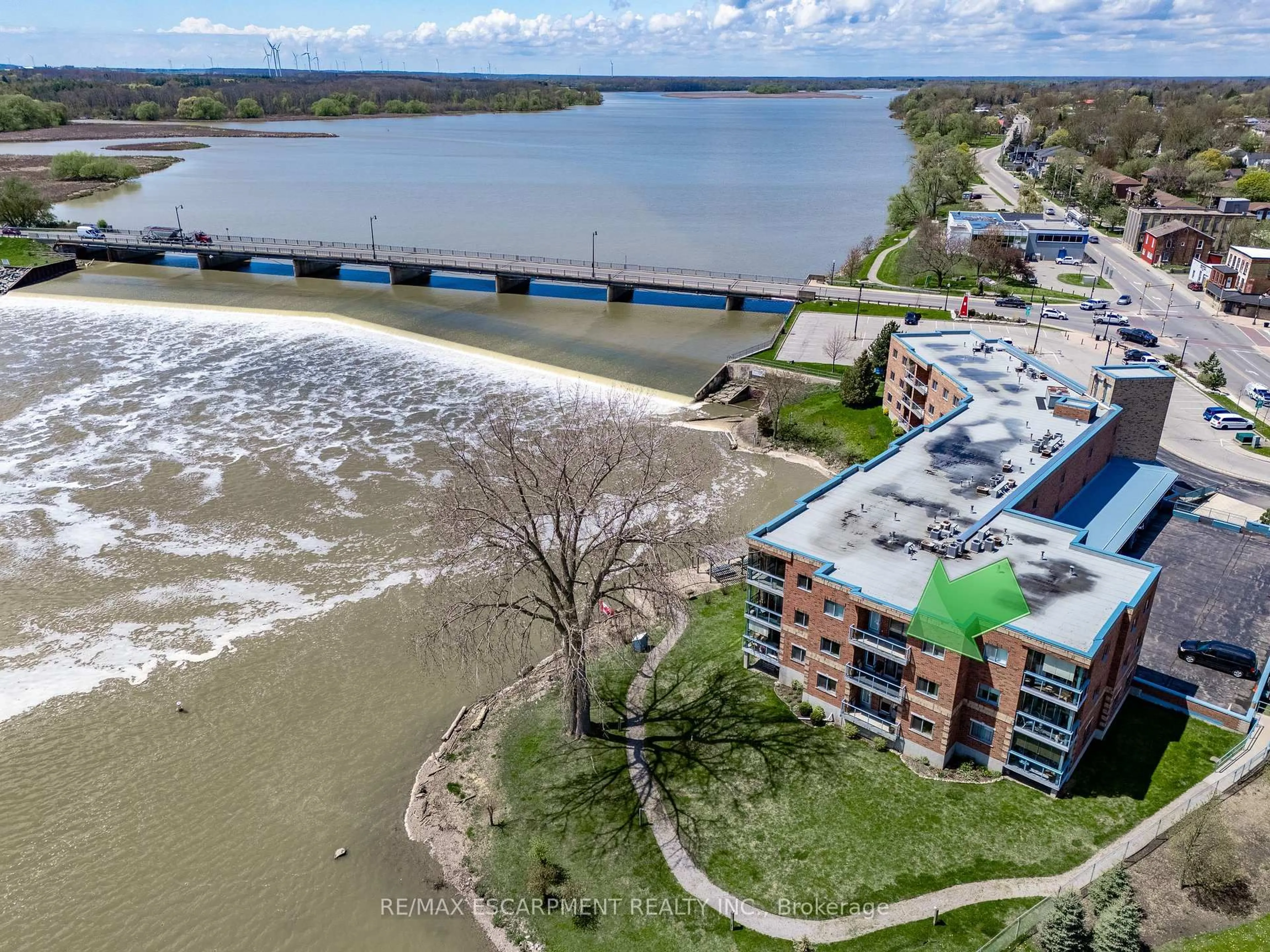 A pic from outside/outdoor area/front of a property/back of a property/a pic from drone, water/lake/river/ocean view for 210 Main St #309, Haldimand Ontario N1A 3G7
