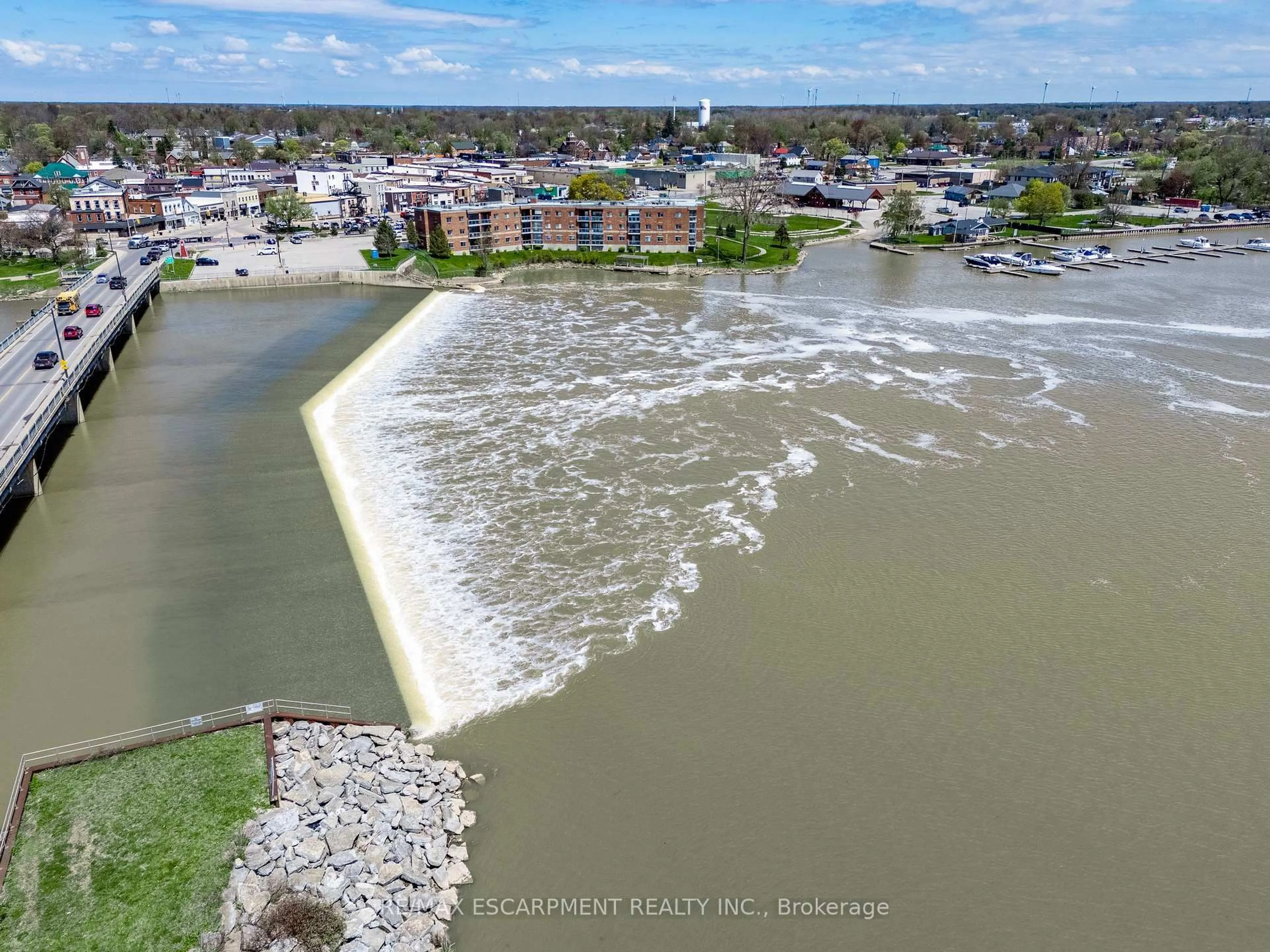 A pic from outside/outdoor area/front of a property/back of a property/a pic from drone, water/lake/river/ocean view for 210 Main St #309, Haldimand Ontario N1A 3G7