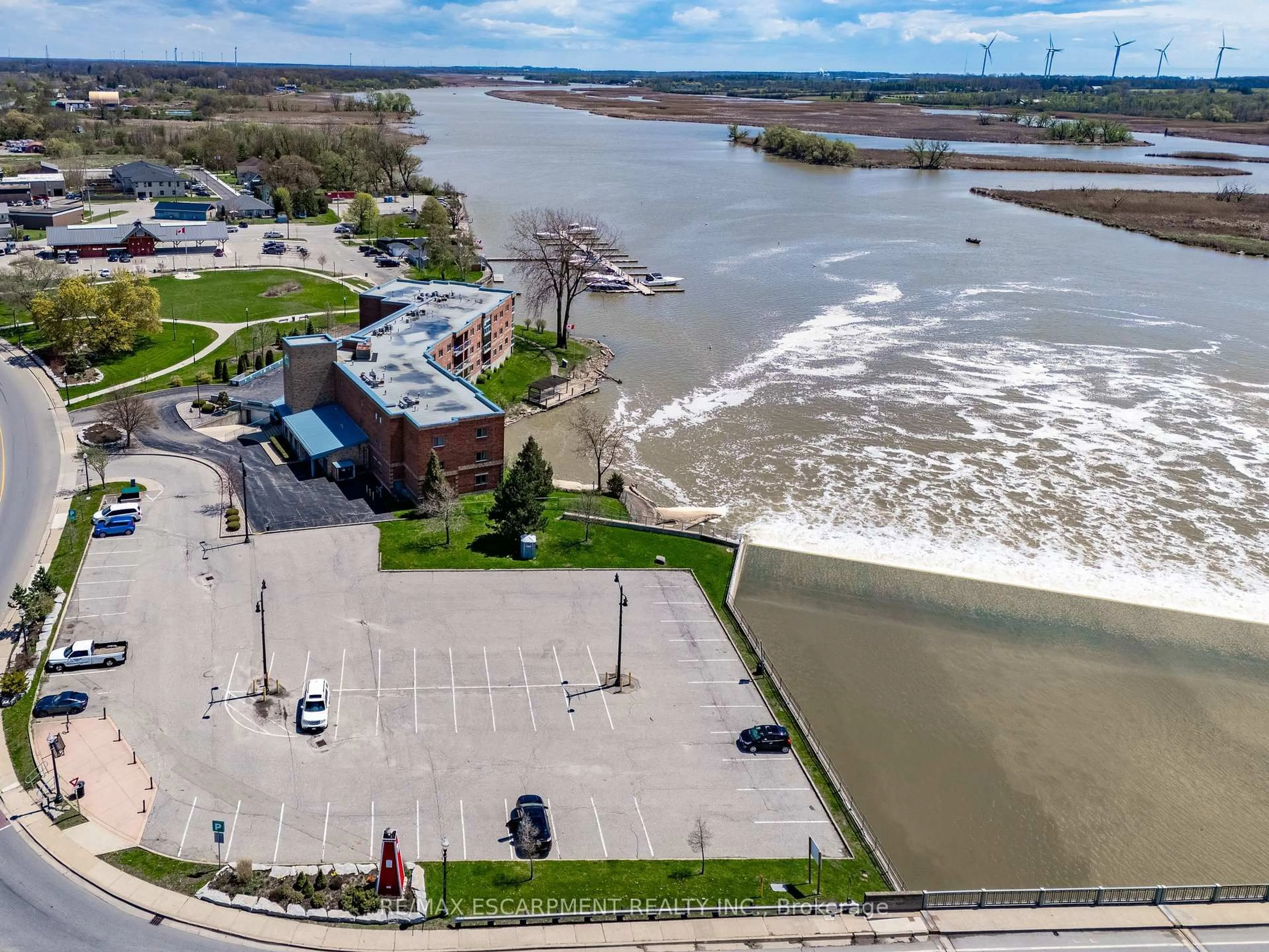 A pic from outside/outdoor area/front of a property/back of a property/a pic from drone, water/lake/river/ocean view for 210 Main St #309, Haldimand Ontario N1A 3G7