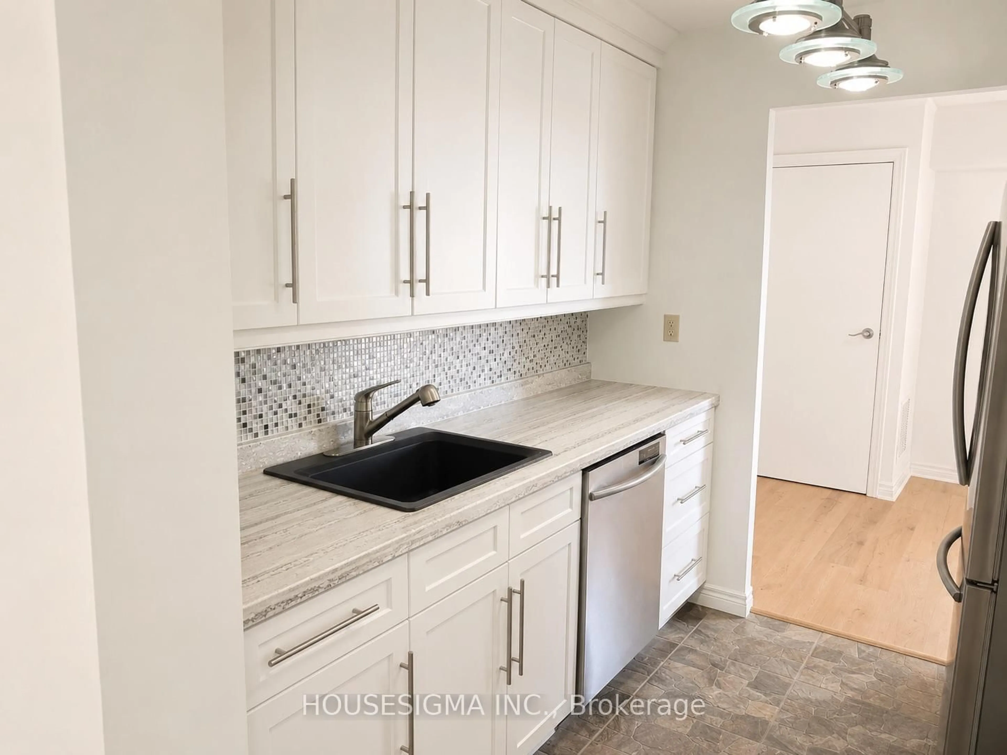 Standard kitchen, ceramic/tile floor for 860 Commissioners Rd #1203, London South Ontario N6C 5Y8
