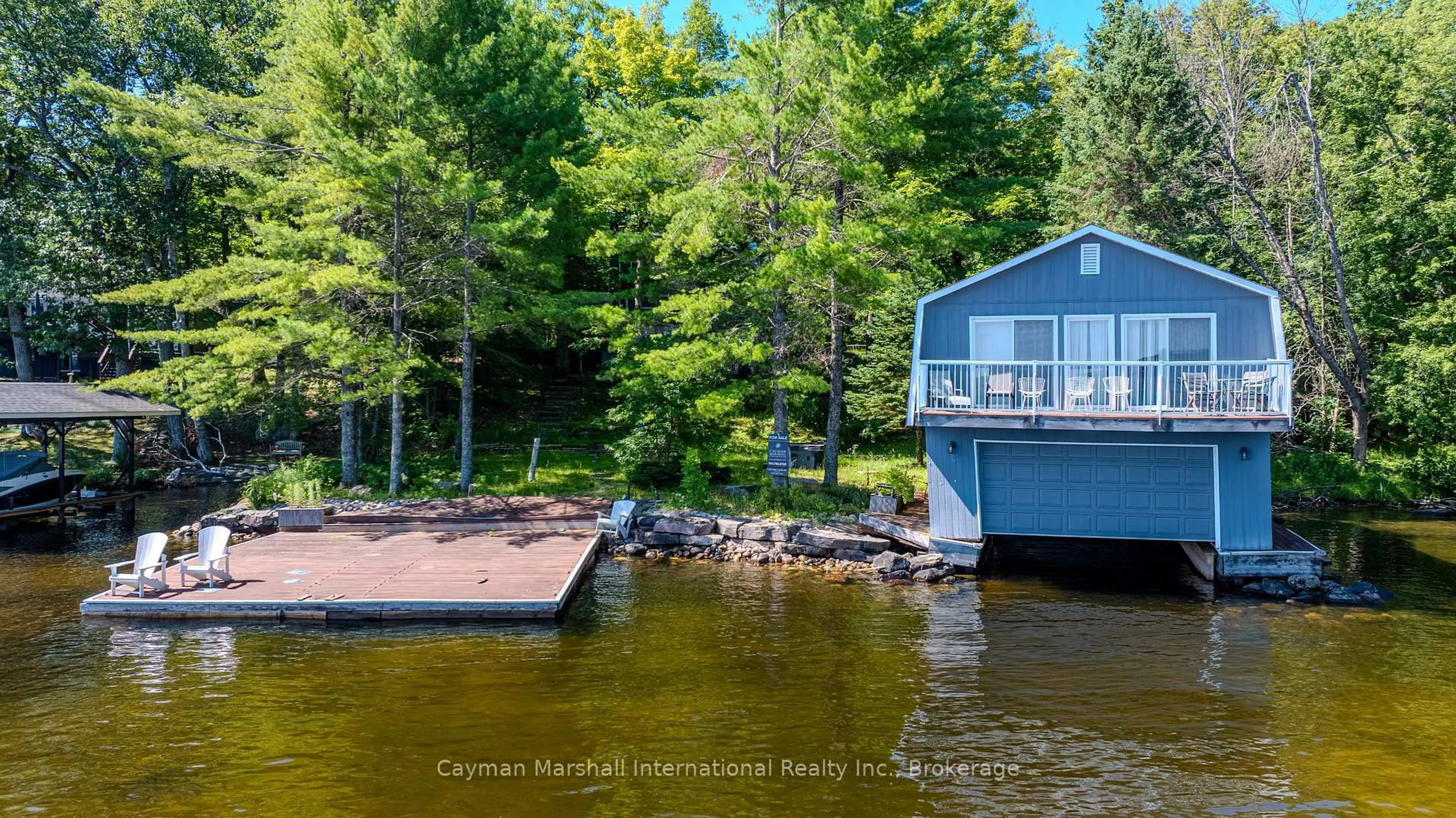 A pic from outside/outdoor area/front of a property/back of a property/a pic from drone, water/lake/river/ocean view for 1685 Walkers Pt Rd, Muskoka Lakes Ontario P1P 1R2