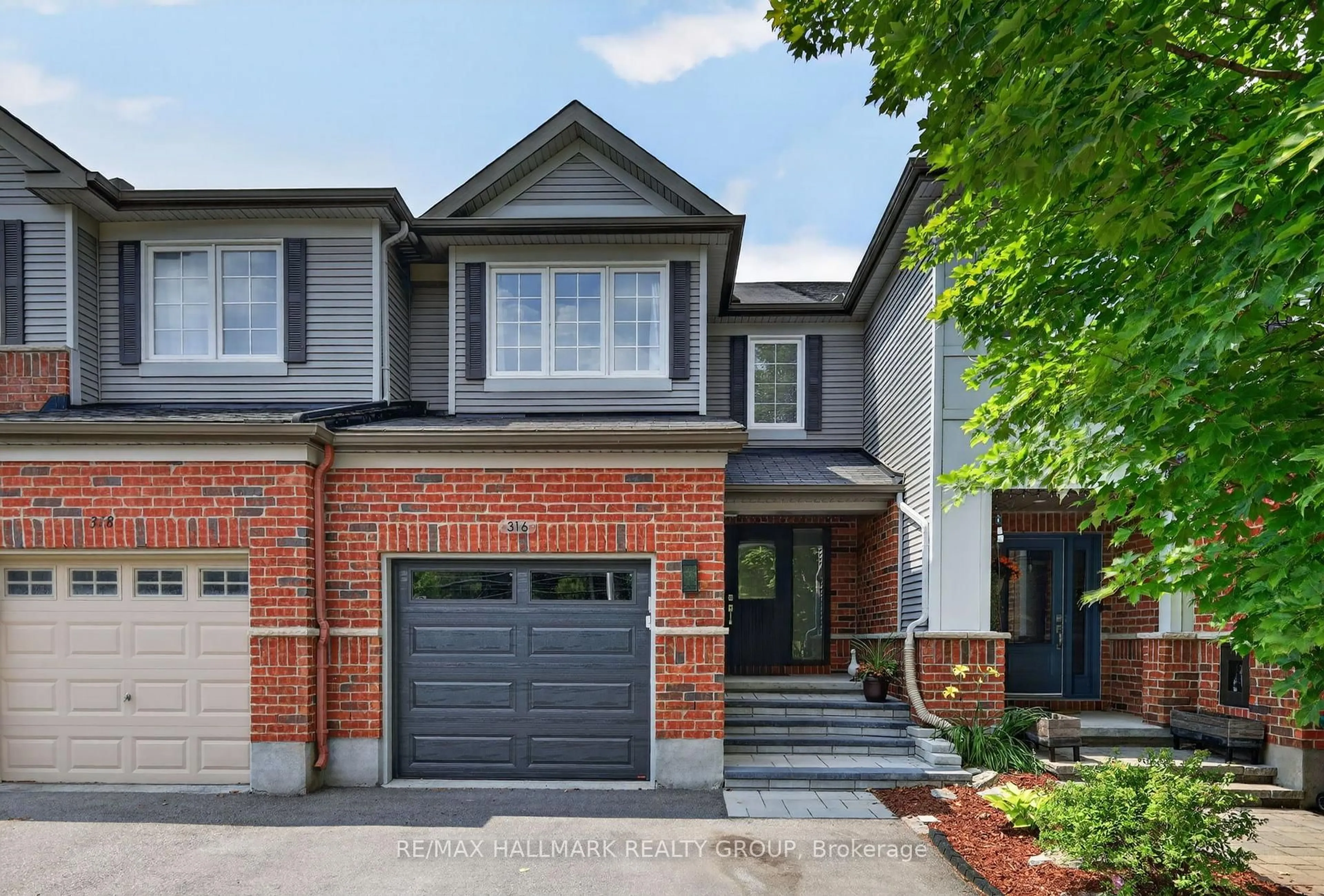 Home with brick exterior material, street for 316 Aldworth Private, Stittsville Ontario K2S 0M9