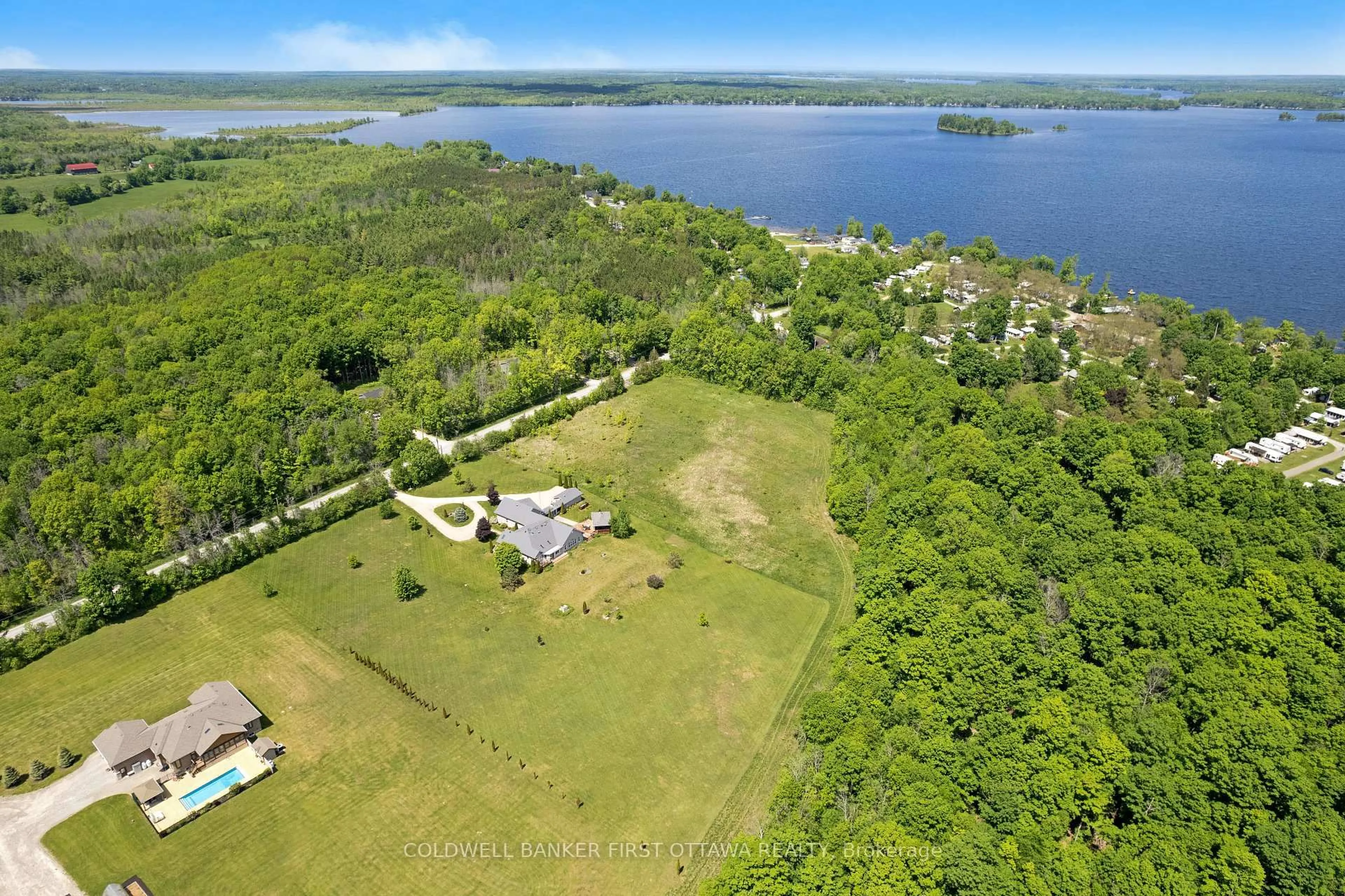 A pic from outside/outdoor area/front of a property/back of a property/a pic from drone, water/lake/river/ocean view for 1111 West Shore Dr, Perth Ontario K7H 0J3