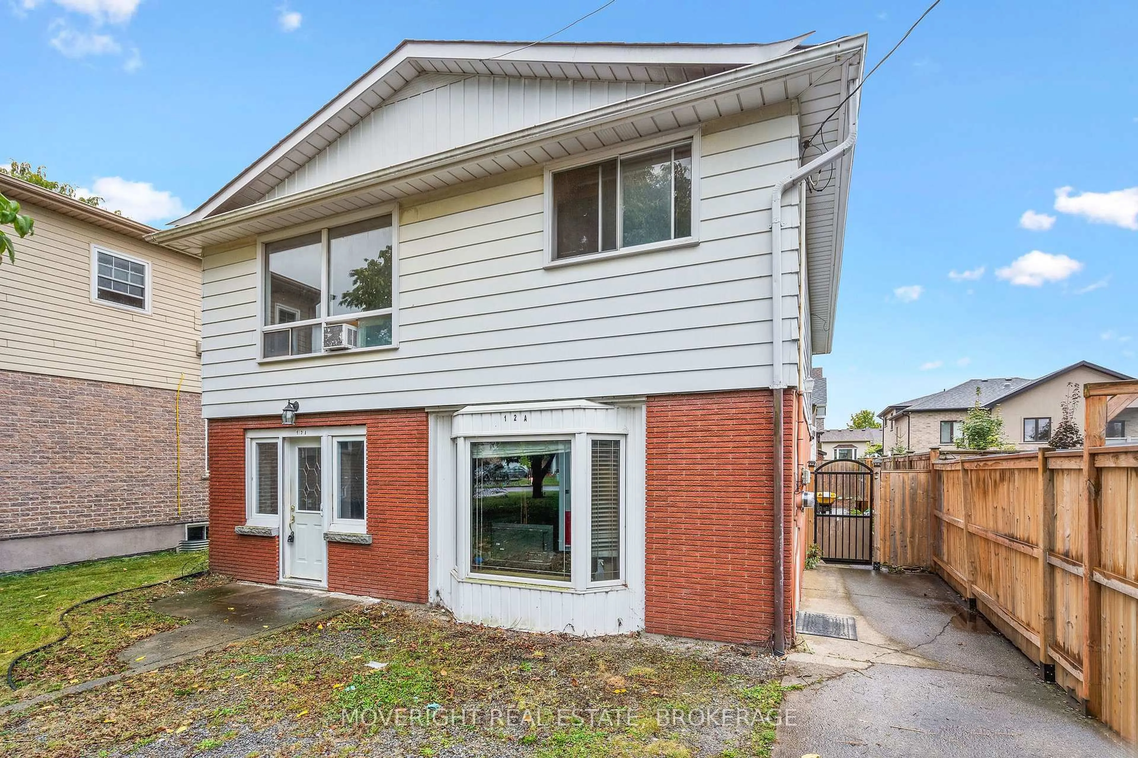 Home with brick exterior material, street for 12 A Third Ave Louth Ave, St. Catharines Ontario L2R 6P9