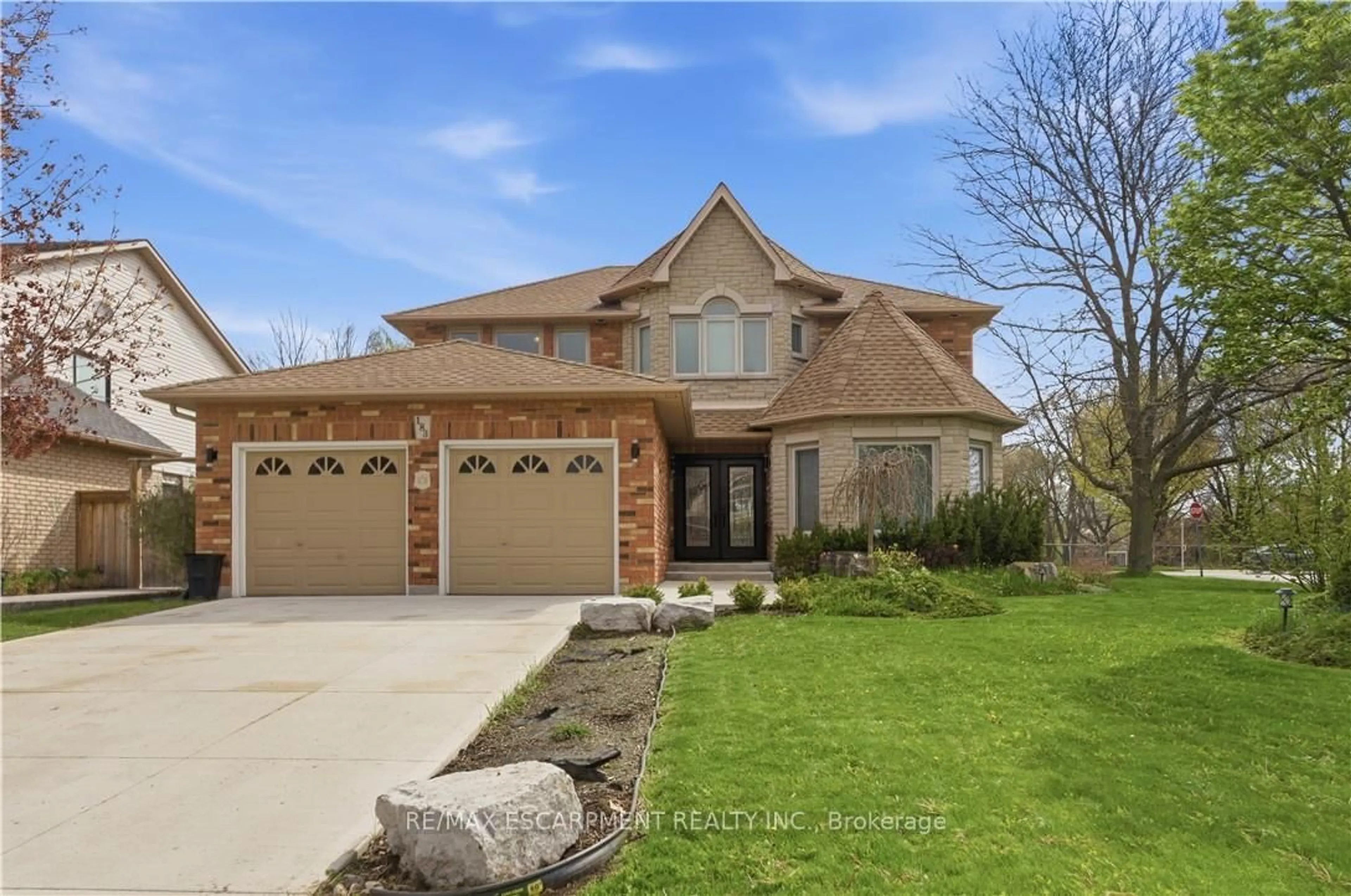 Home with brick exterior material, street for 183 Daniels St, Hamilton Ontario L9G 4Y6