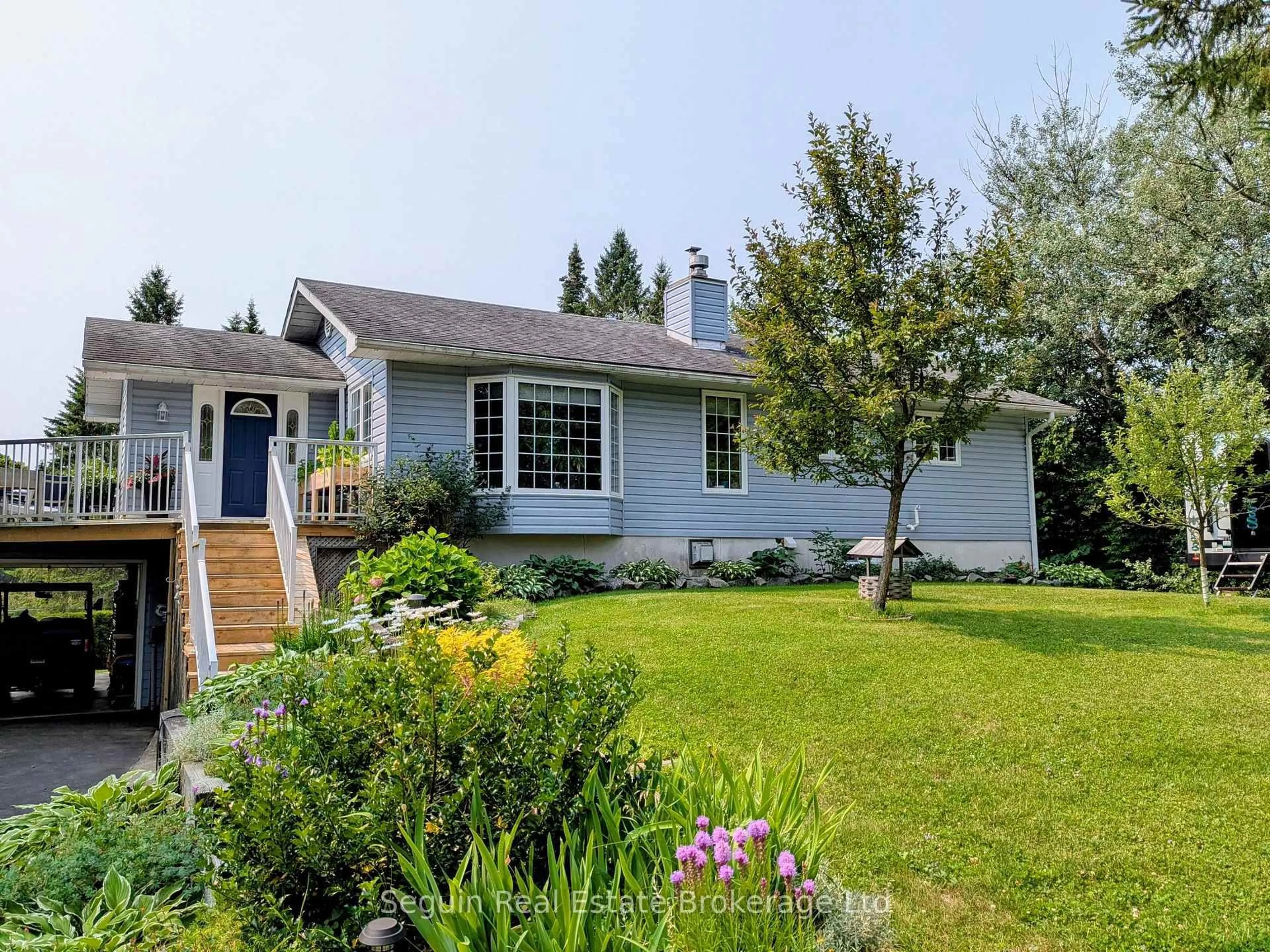 Home with vinyl exterior material, street for 1091 HIGHWAY 518 Highway, Seguin Ontario P2A 0B6