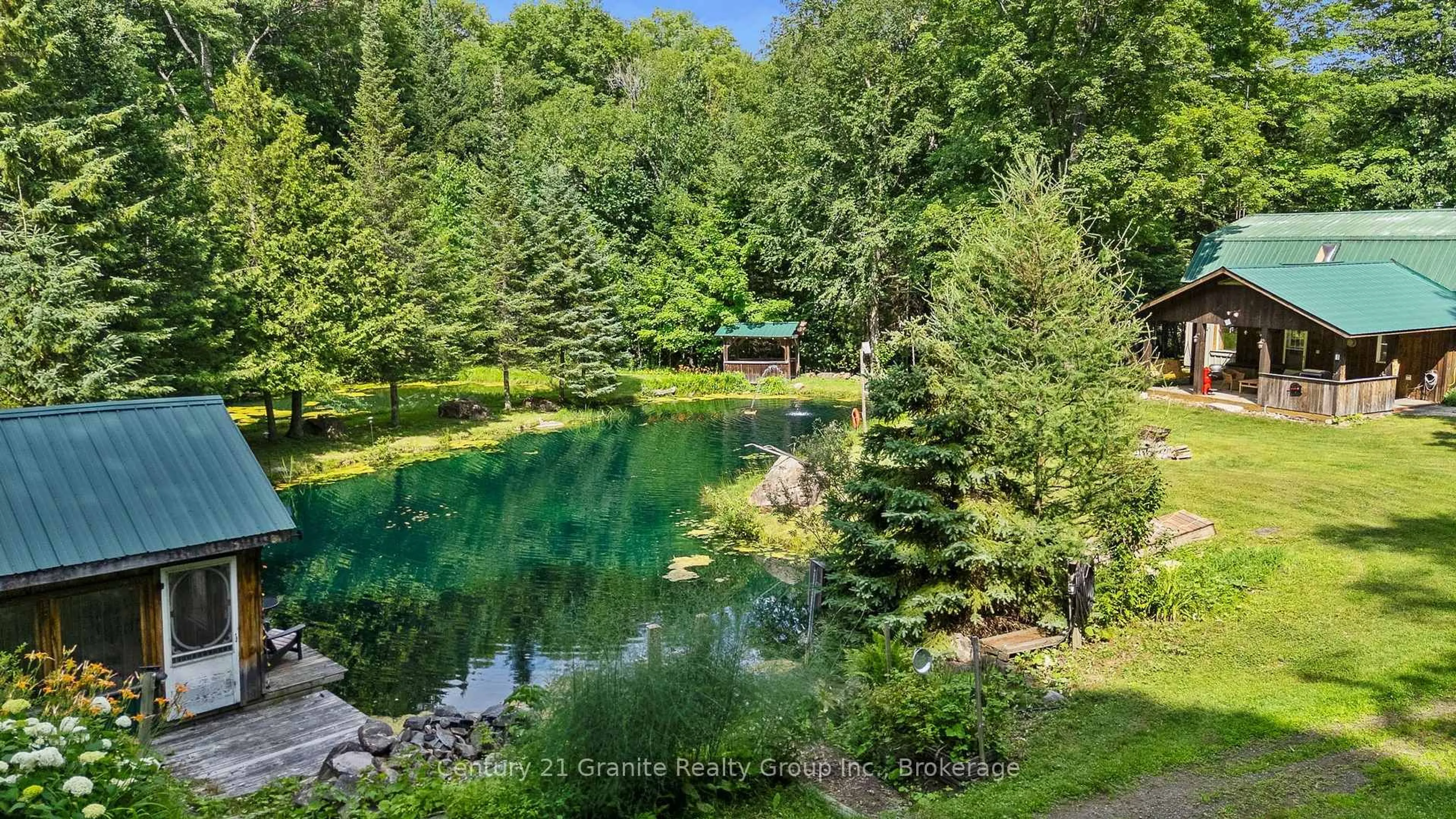 A pic from outside/outdoor area/front of a property/back of a property/a pic from drone, water/lake/river/ocean view for 1291 Horseshoe Lake Rd, Minden Hills Ontario K0M 2K0
