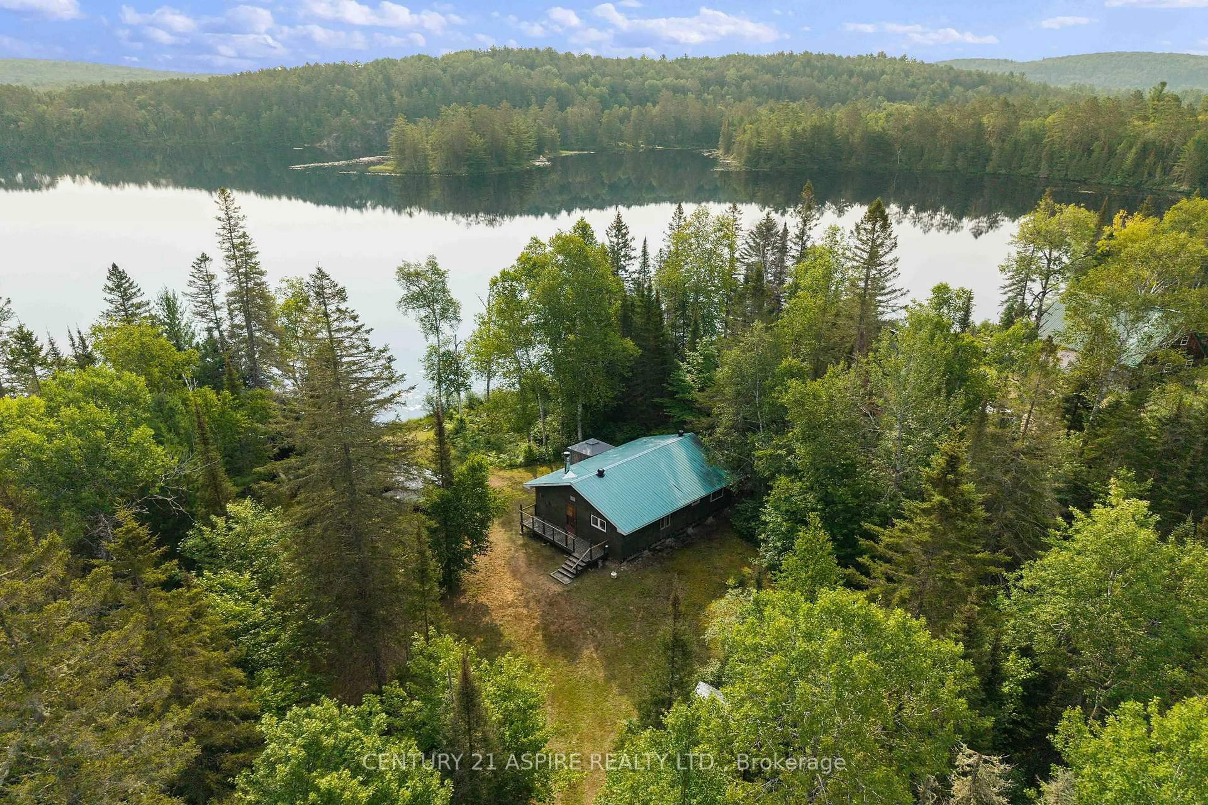 A pic from outside/outdoor area/front of a property/back of a property/a pic from drone, water/lake/river/ocean view for 1953 Little Papineau Lake Rd, Maple Leaf Ontario K0L 2R0